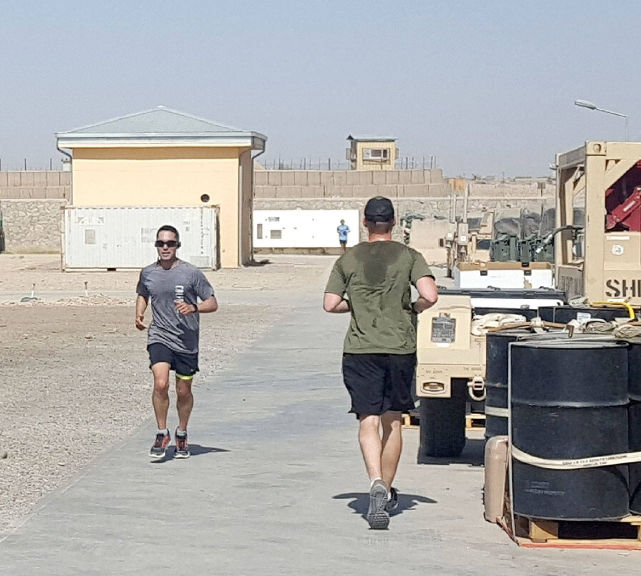 Participants in the Run for Joe “shadow run” in Afghanistan run to raise awareness for the Captain Joseph House in Port Angeles.