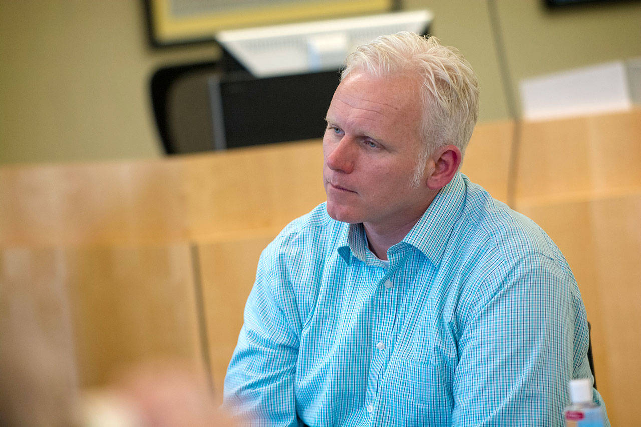 State Sen. Kevin Van De Wege, D-Sequim, listens to school administrators at the end of a closed-door meeting in Sequim concerning school funding. (Jesse Major/Peninsula Daily News)