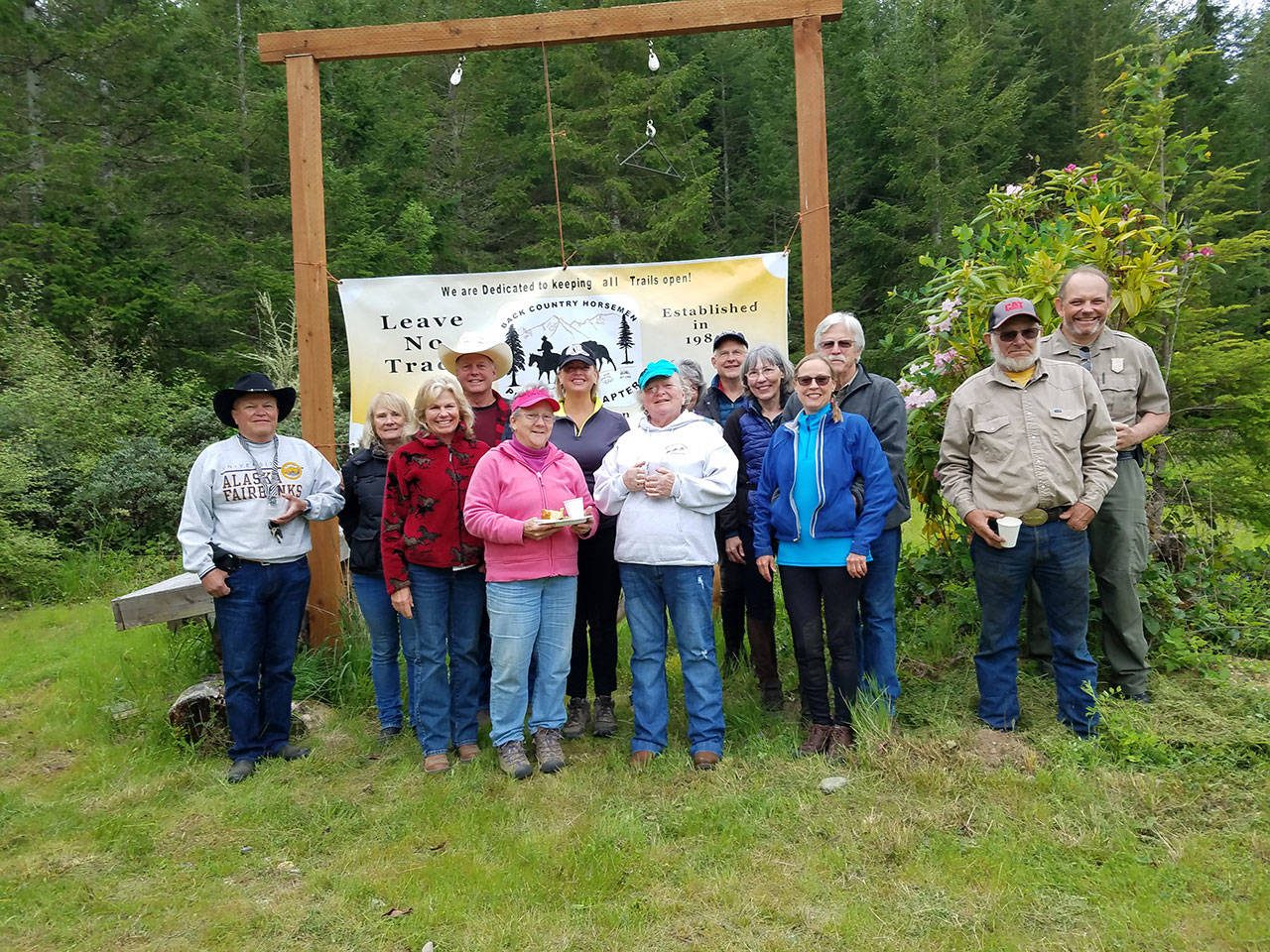 Back Country Horsemen’s Peninsula chapter members took part in their annual Miller Peninsula “Rhody Ride,” timed when all the Rhododendrons are in full bloom. (Linda Morin)