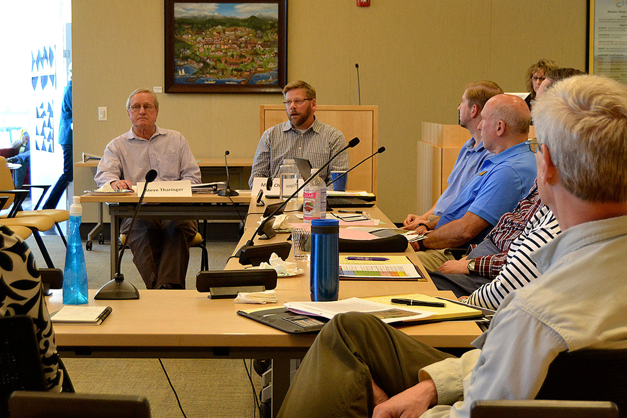 State Reps. Steve Tharinger and Mike Chapman discuss funding strategies for completing the Simdars Road interchange off East Washington Street in Sequim. (Matthew Nash/Olympic Peninsula News Group)