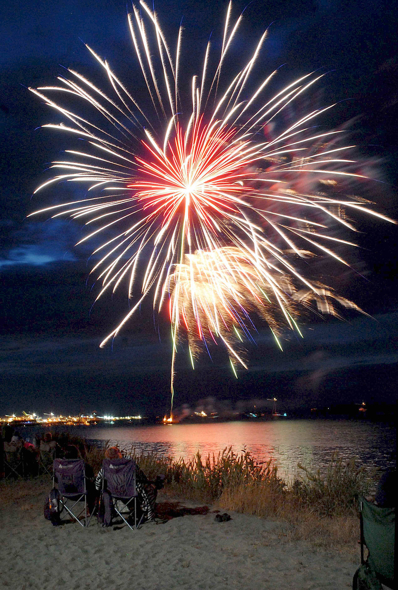 Fireworks light up the night over Port Angeles Harbor on Independence Day. (Keith Thorpe/Peninsula Daily News)