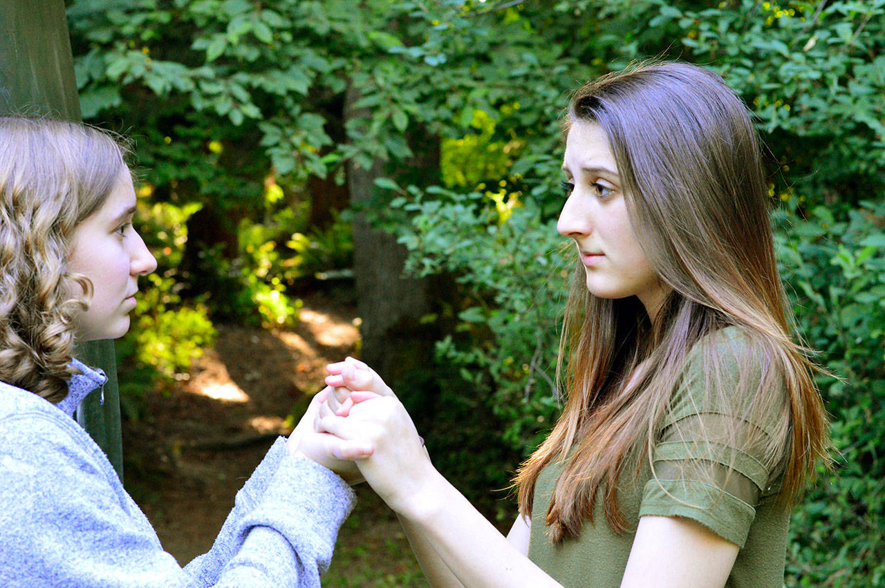 Celia (Sage Hunter), left, and Rosalind (Madelynne Jones) are cousins exiled to the Forest of Arden in “As You Like It,” the Shakespeare in the Woods production at the Port Angeles Fine Arts Center beginning Friday. (Diane Urbani de la Paz/for Peninsula Daily News)
