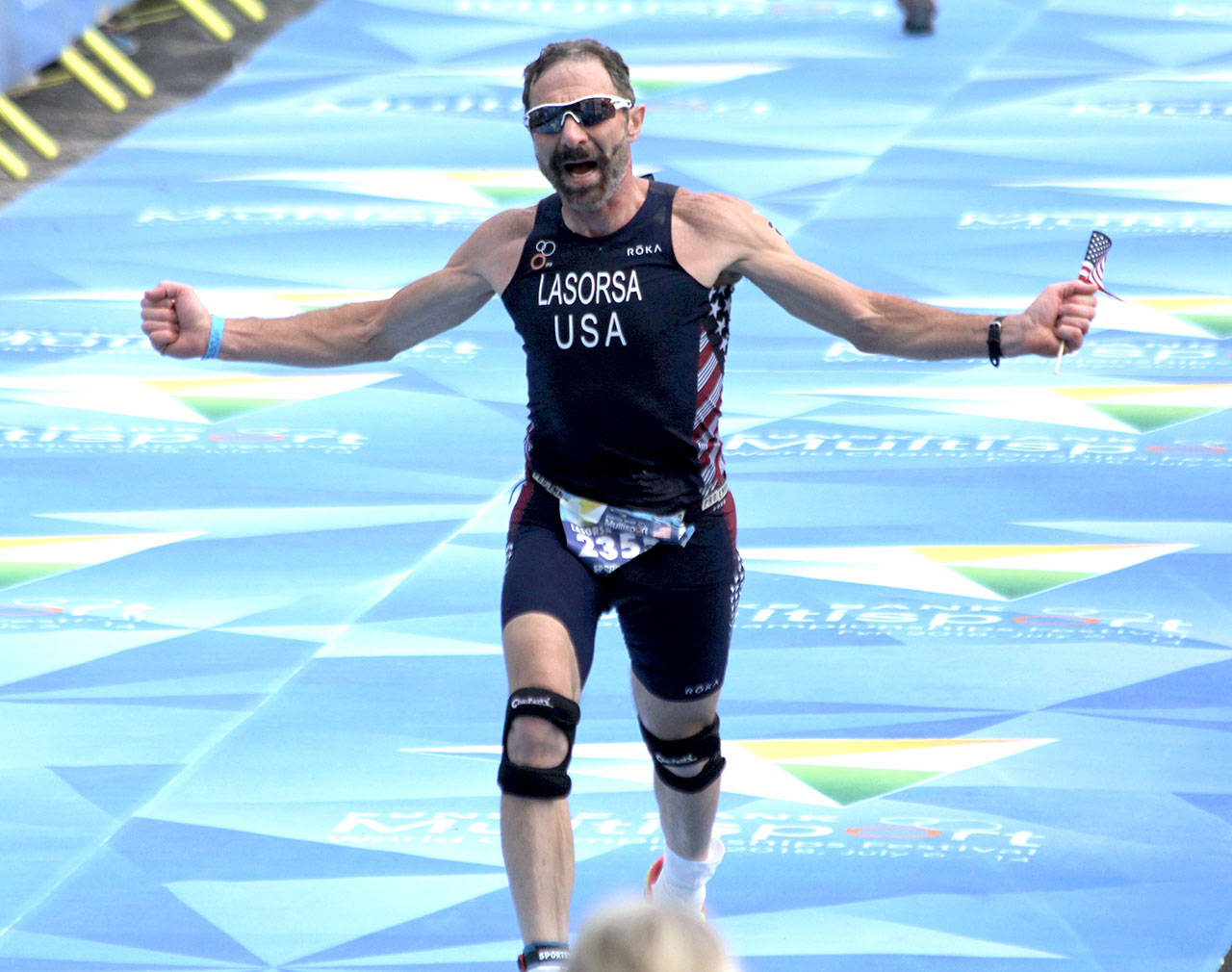 Port Angeles’ Dave Lasorsa crosses the finish line at the Sprint Duathlon World Championship, held in Odense, Denmark earlier this month. Lasorsa placed 15th in the 60-64 age group at the World Championship.