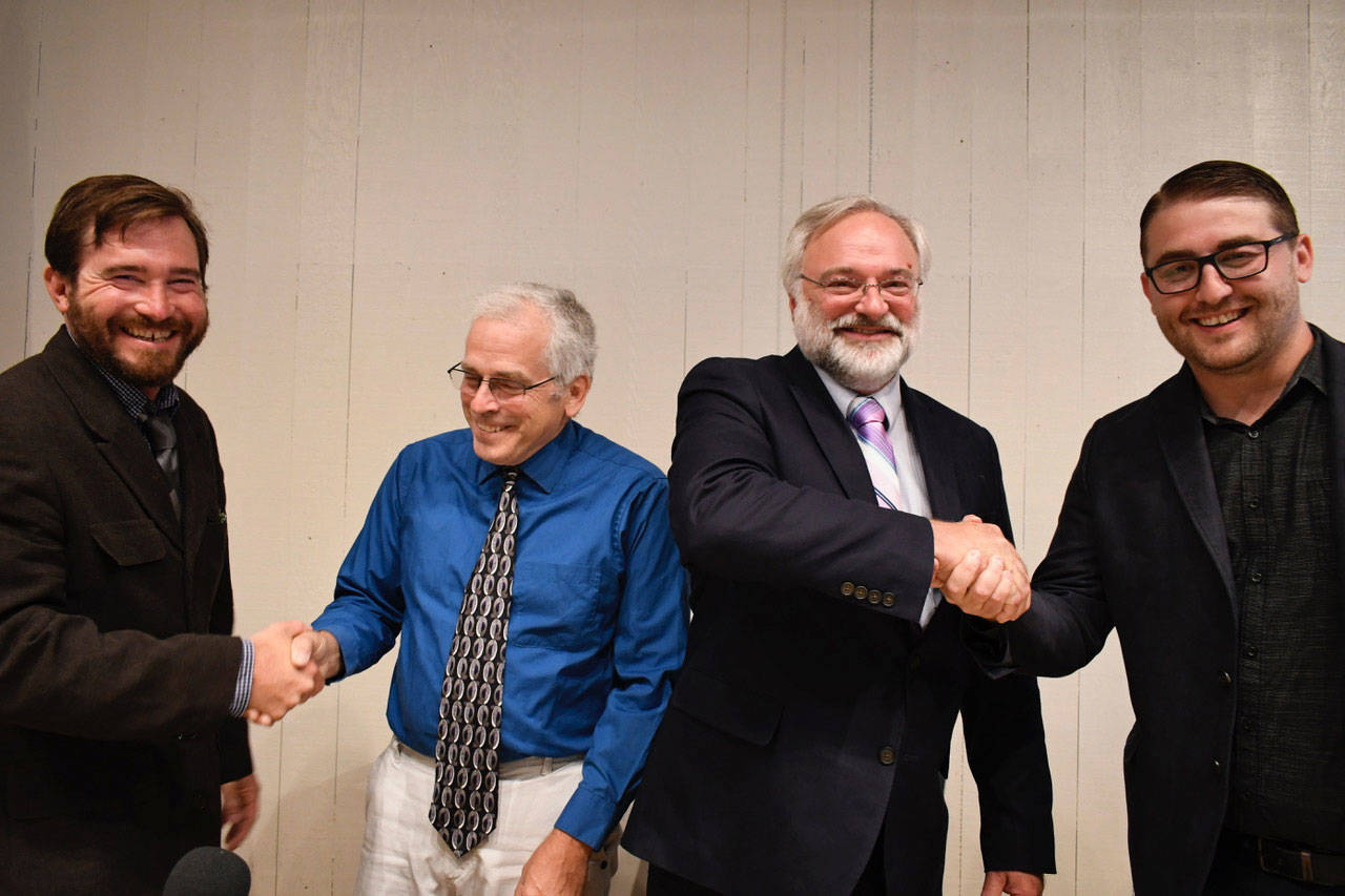 District 3 Jefferson County Board of Commissioners candidates met in Port Ludlow for a forum Wednesday evening. The candidates are, from left, Greg Brotherton (D), Jon Cooke (R), Craig Durgan (D) and Ryan McAllister (D). (Jeannie McMacken/Peninsula Daily News)