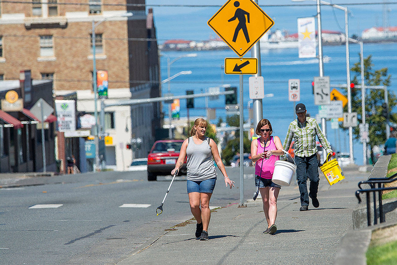 ‘Eager to give back’: People take to streets for cleanup in Port Angeles