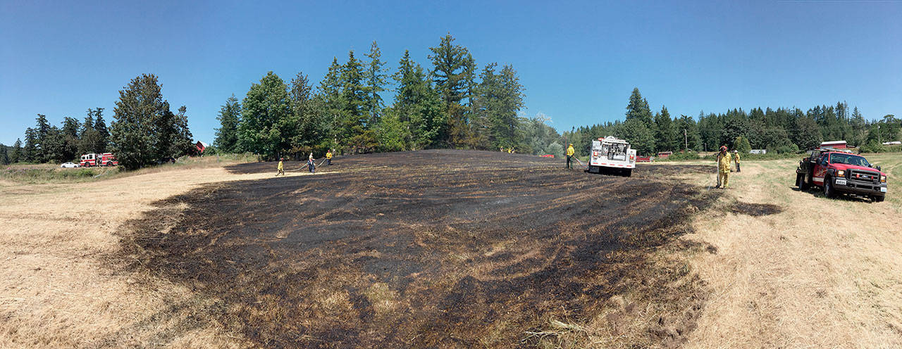 A brush fire burned near the intersection of Center Valley Road and Egg & I Road in Chimacum before being extinguished Tuesday afternoon.