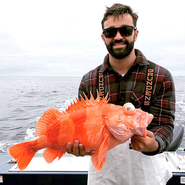 Department of Fish and Wildlife Tacoma’s John Sly caught the state’s first record-setting redbanded rockfish (7.54 pounds) while jigging with herring off of Westport on June 21.