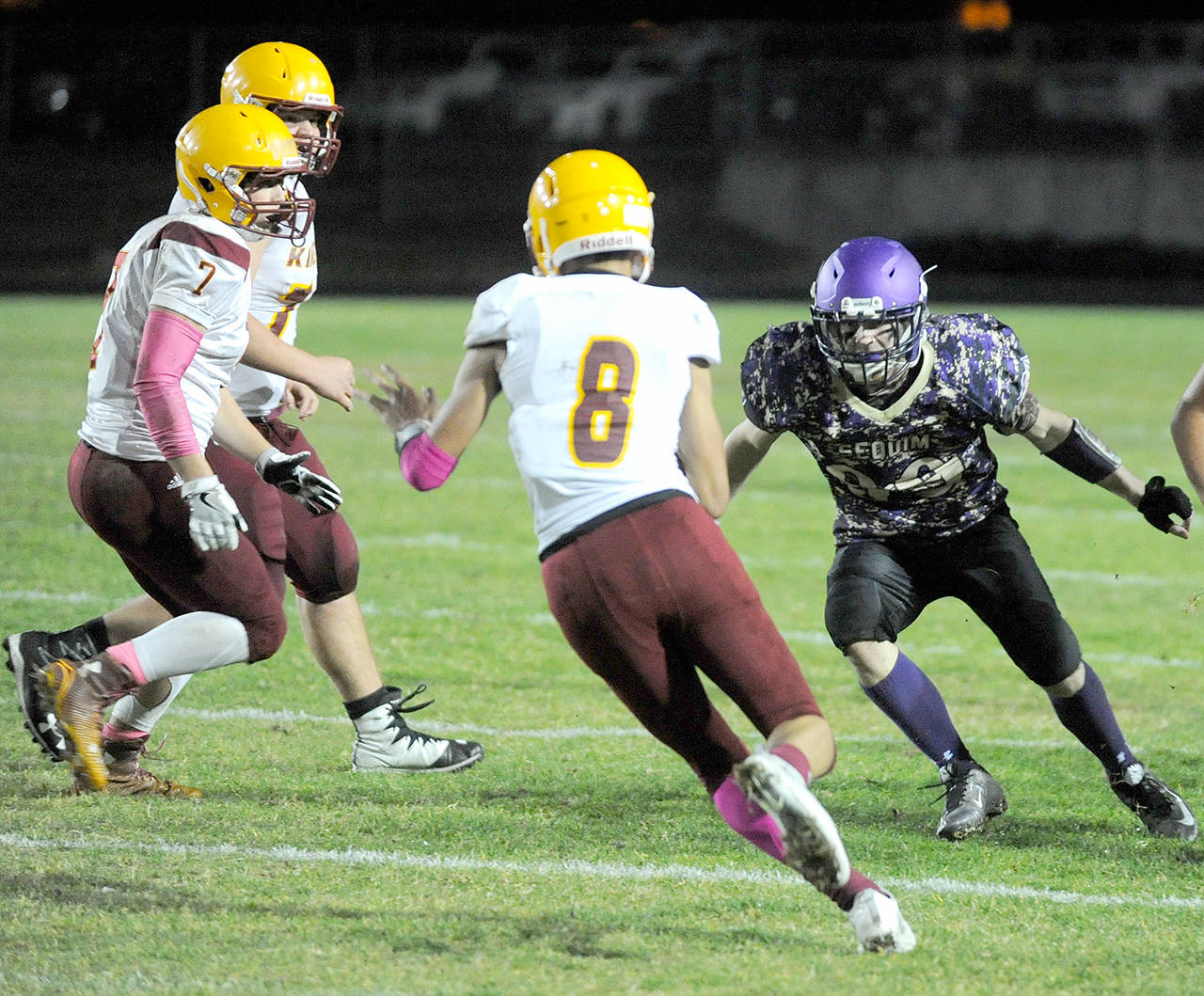 Sequim’s Ben Cowan, right, was a second-team All-Olympic League selection at defensive end last season. Michael Dashiell/Olympic Peninsula News Group