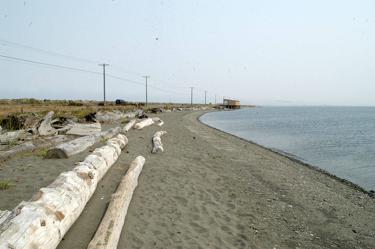 The beach at the Port Angeles Sail and Paddle Park is shown Wednesday. The Olympic Peninsula Rowing Association boathouse is in the background. (Rob Ollikainen/Peninsula Daily News)