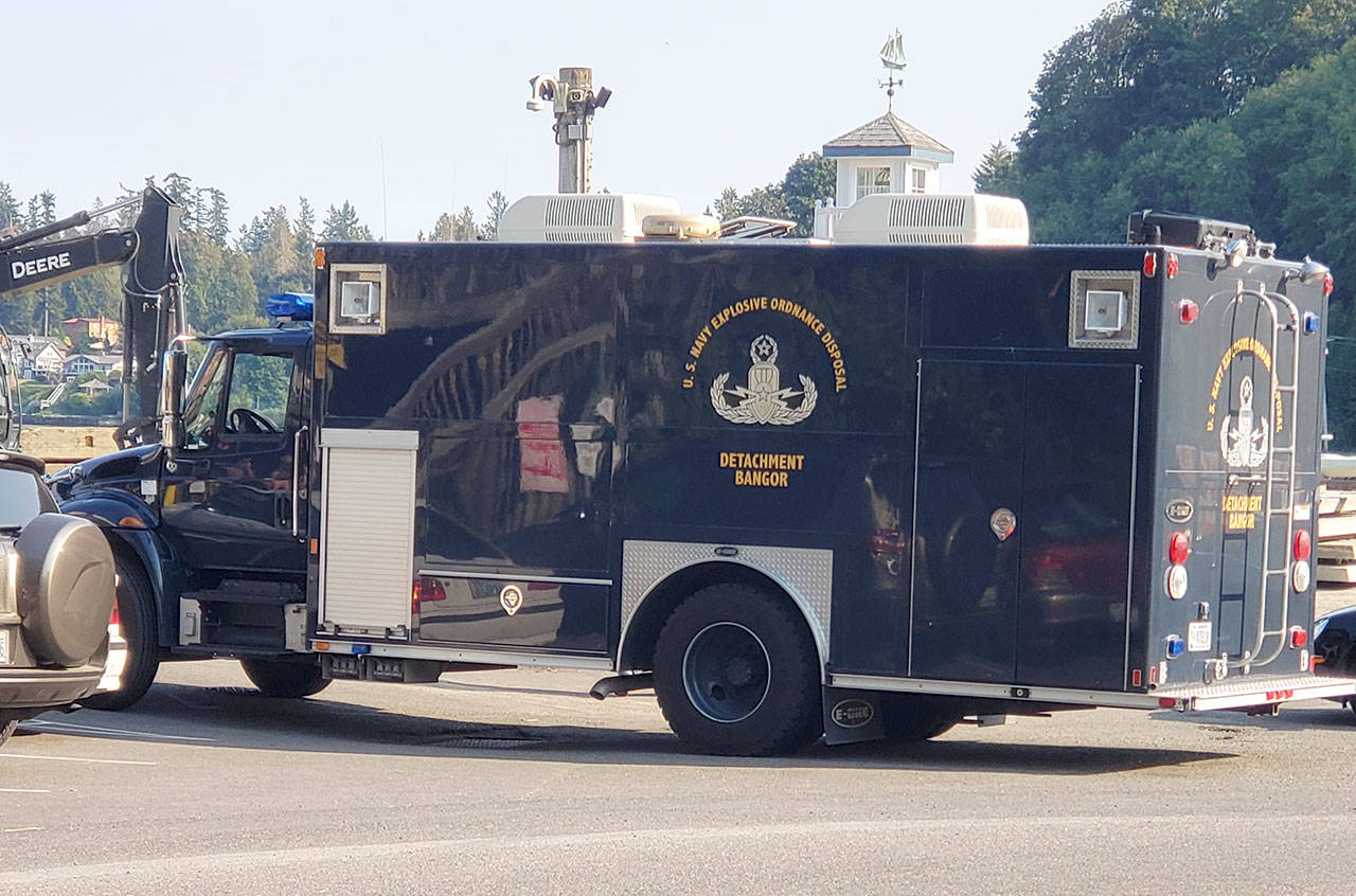 A U.S. Navy Explosive Ordnance Disposal unit arrives Tuesday afternoon at the Brownsville Marina. (Robert Zoullna/Kitsap News Group)