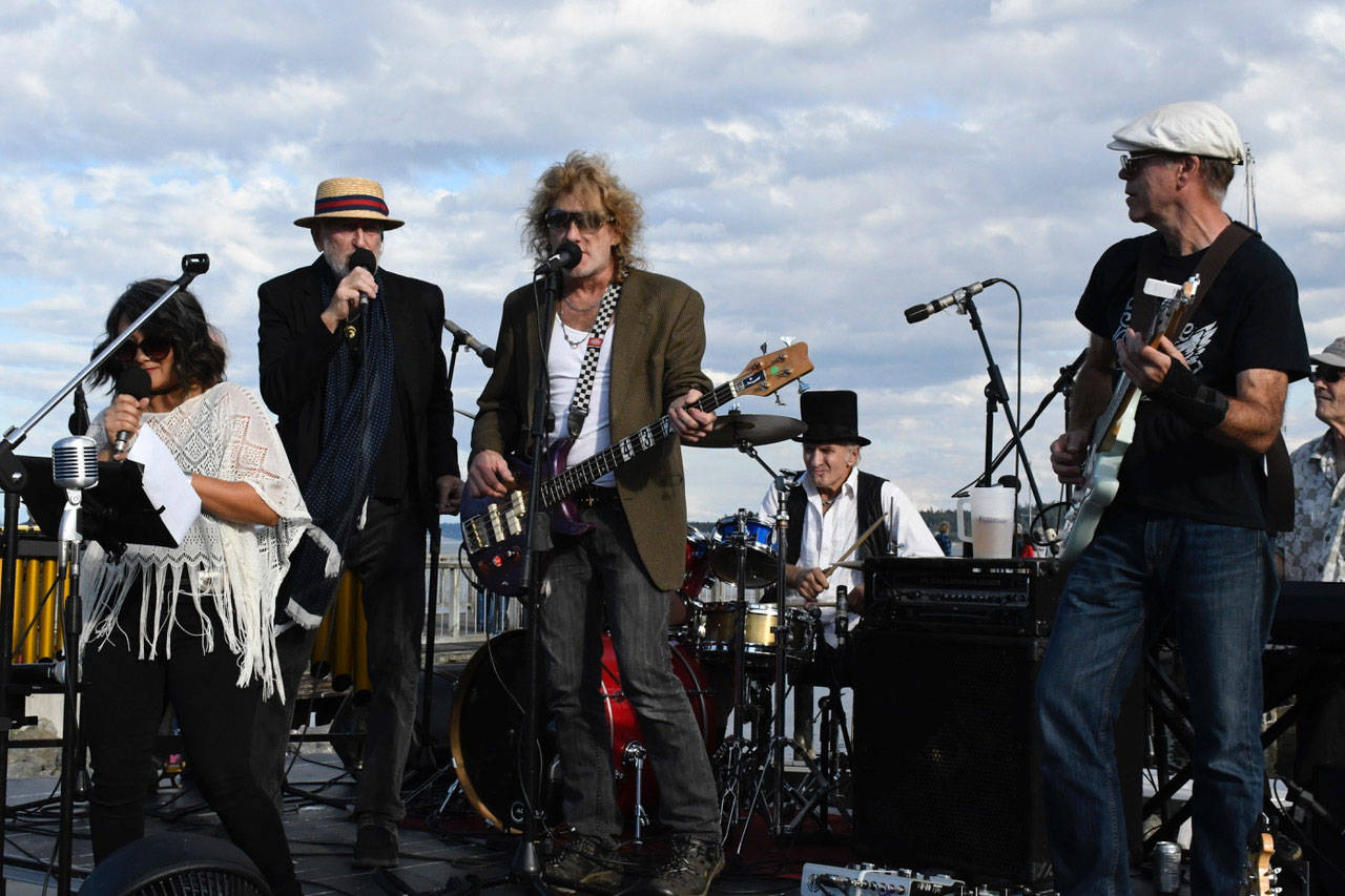 Kevin Mason and the PT All Stars performed at the final summer Concerts on the Dock show Thursday, concluding another successful music season presented by the Port Townsend Main Street Program. Rocking the stage were, from left, Christa Holbrook, Mason, Mark Parris, Ricky Lynn Johnson, Doug Noltmeier and George Radabaugh. Not shown is Tom Collier. (Jeannie McMacken/Peninsula Daily News)