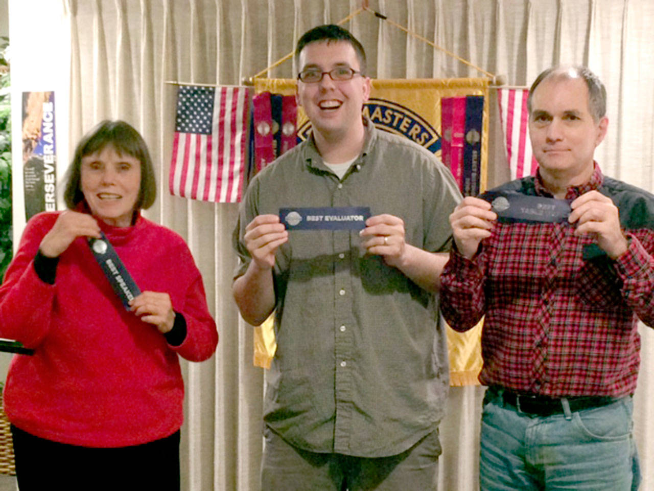 Skwim Toastmasters Club members Linda Christensen, Jeff Tingelstad and Craig Barron display their recent honors.
