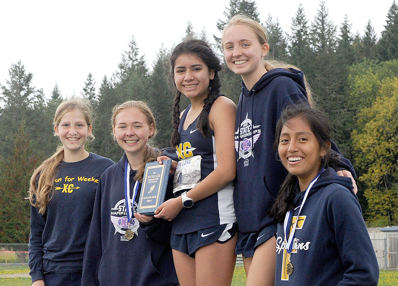 The Forks girls’ cross-country team took first place out of the 14 teams at the Toutle Lake Invitational on Saturday. From left are Savannah Meyer, Madelyn Archibald, Karen Ensastegui, Kayleen Bailey and Melissa Galindo. (Lonnie Archibald/for Peninsula Daily News)