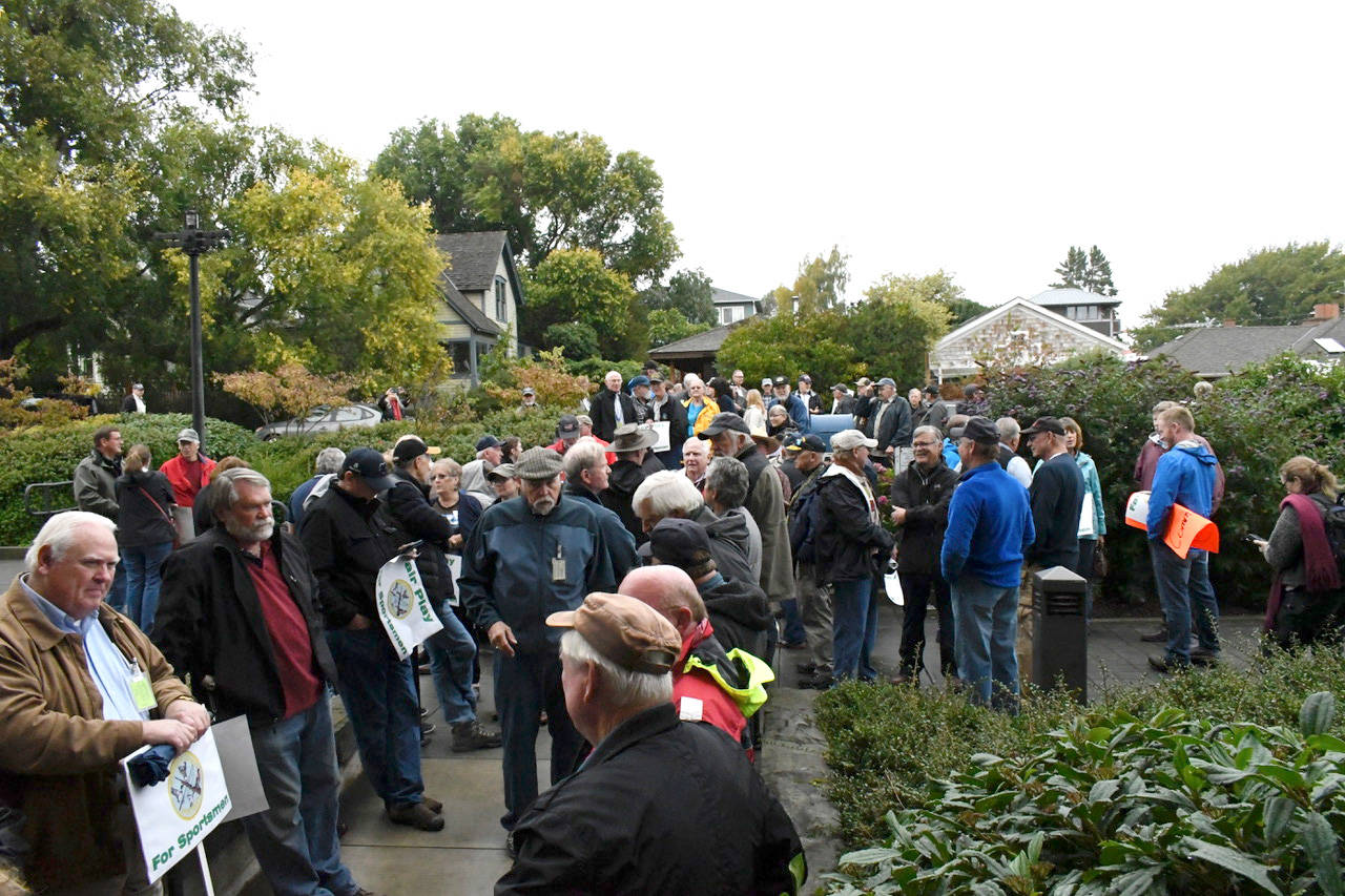 Attendees begin lining up at 4 p.m. at Jefferson County Courthouse to provide testimony about the draft Commercial Shooting Facility Ordinance. A crowd of 325 attended. (Jeannie McMacken/Peninsula Daily News)