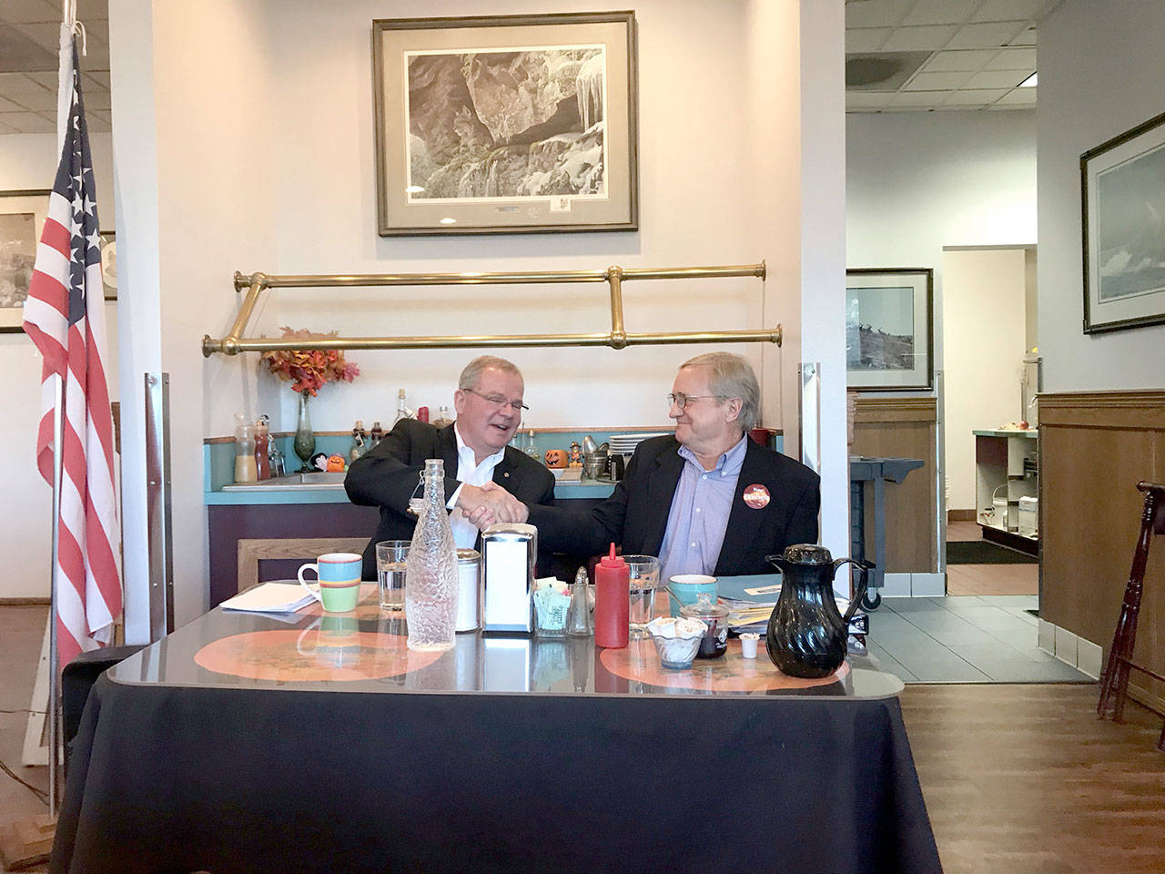 Jim McEntire, left, a challenger for a 24th District state legislative seat, and Steve Tharinger, the incumbent, ended their general election forum Tuesday on a congenial note. (Paul Gottlieb/Peninsula Daily News)