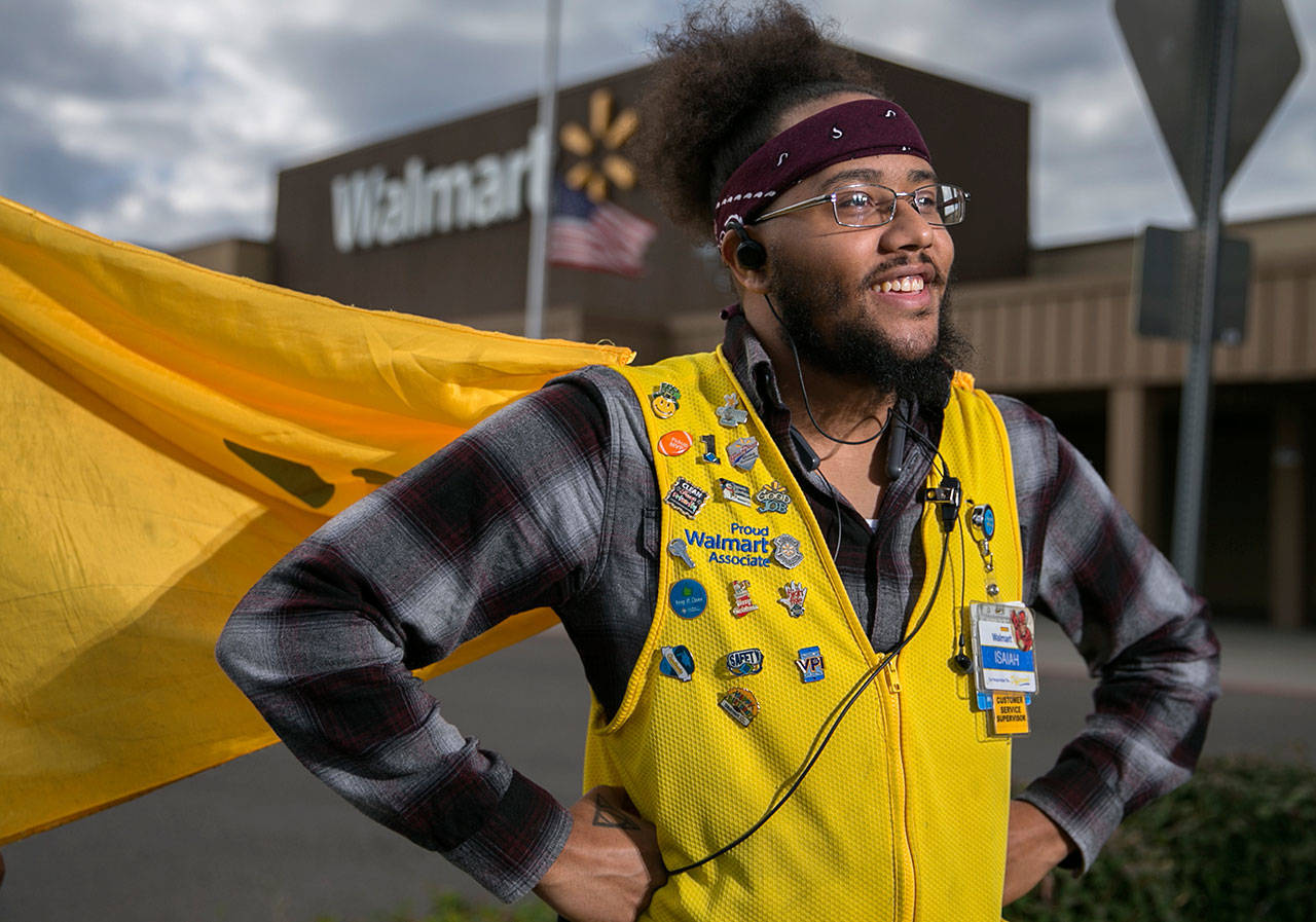 In this Aug. 30 photo, Isaiah Owens wears a cape as part of the back-to-school season at the Walmart in Everett. (Kevin Clark/The Herald via AP)