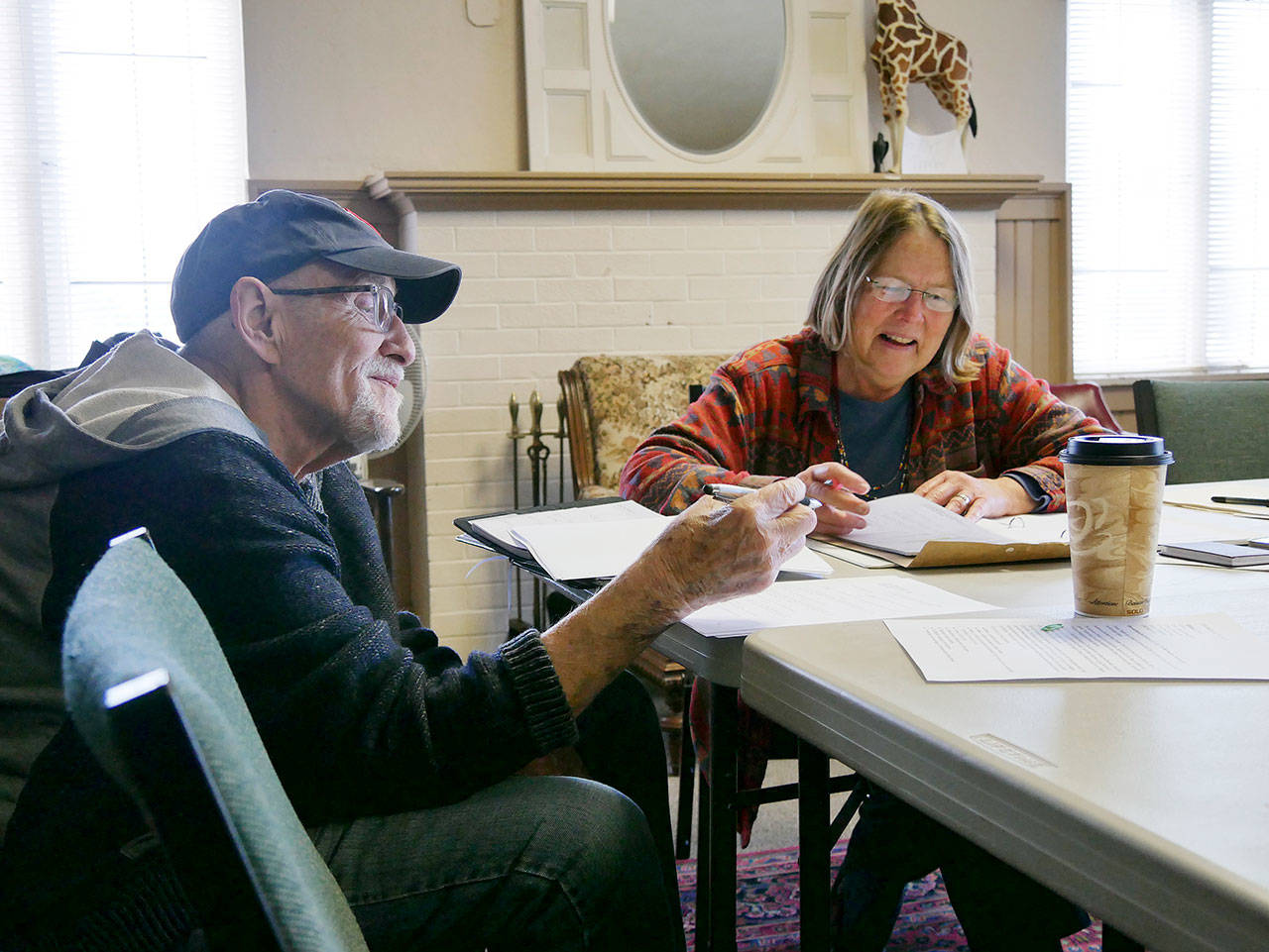 Contributing author Jim Guthrie and Carol Willis, Olympic Theatre Arts’ executive director, finalize the script for “The Nutcracker Cracked Up.” (Olympic Theatre Arts)
