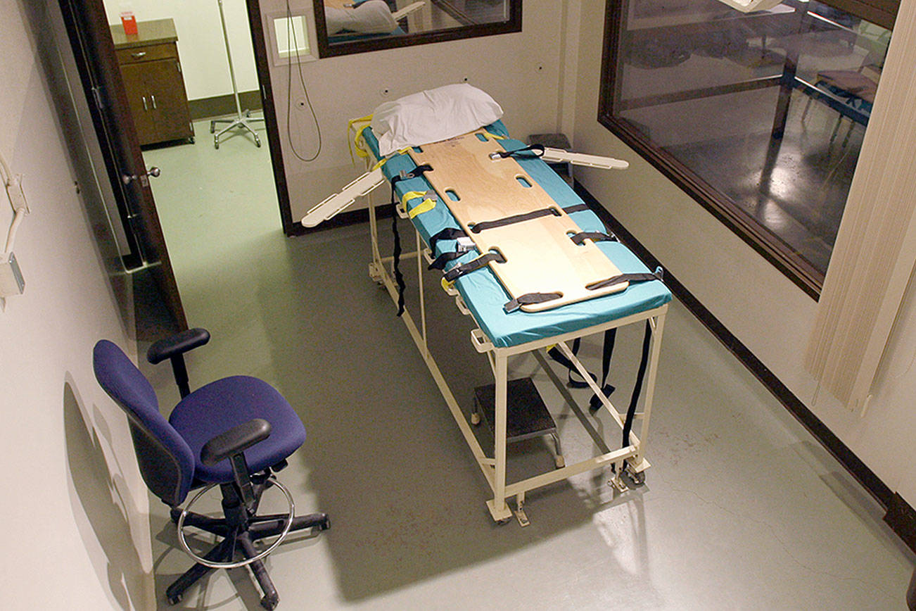 In this file photo, the execution chamber at the Washington State Penitentiary in Walla Walla is shown with the witness gallery behind glass at right. Washington state’s Supreme Court has ruled that the death penalty violates its Constitution. Thursday’s ruling makes Washington the latest state to do away with capital punishment. They ordered that people currently on death row have their sentences converted to life in prison. (AP Photo/Ted S. Warren)