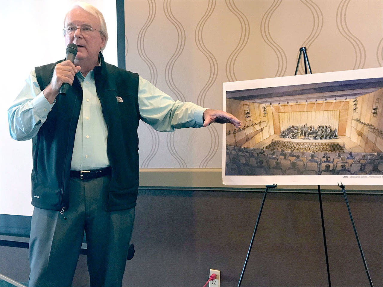 Brooke Taylor, Port Angeles Waterfront Center board chairman, described the performance hall of the planned center Wednesday at a Port Angeles Regional Chamber of Commerce luncheon. (Paul Gottlieb/Peninsula Daily News)