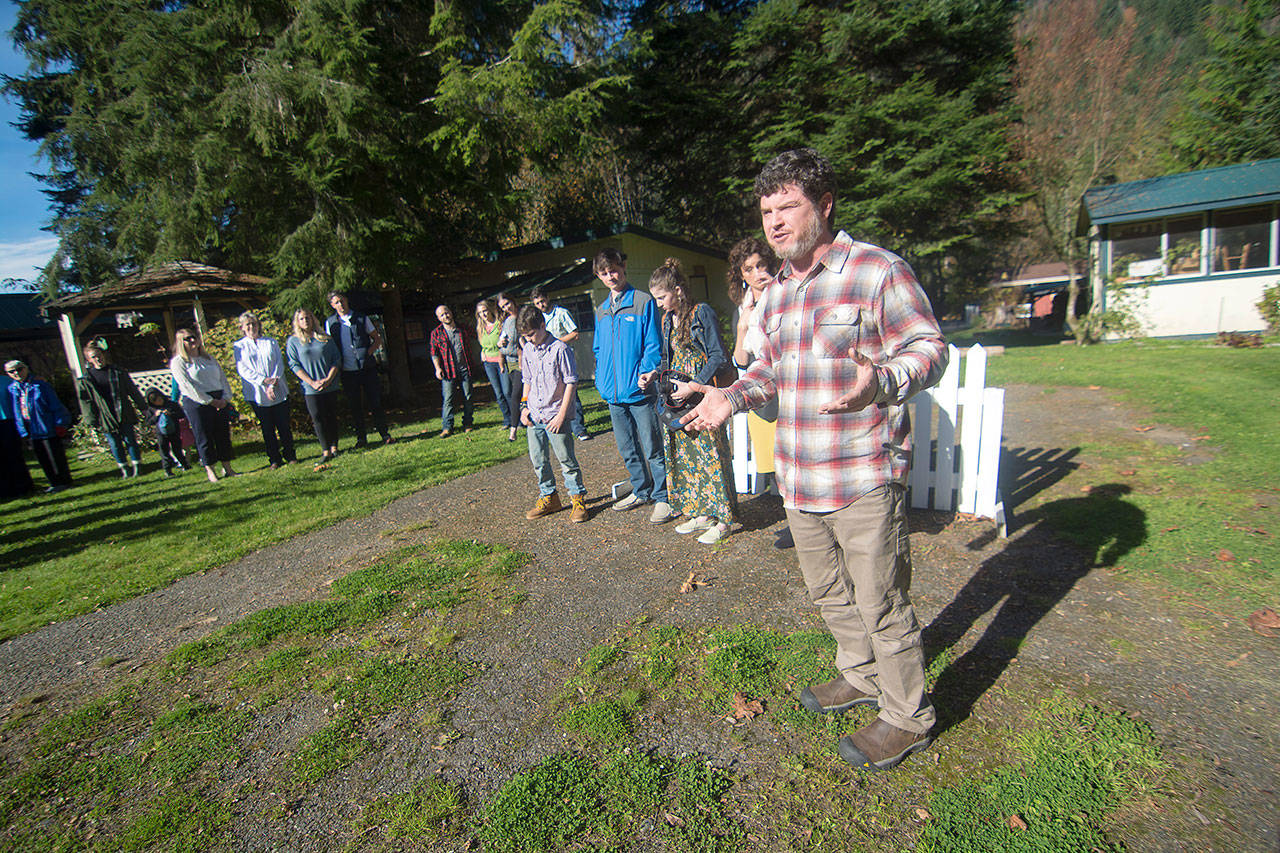 Tim Pinson, the new owner of Granny’s Cafe, announces his vision for the iconic restaurant during an event Sunday. He said he plans to keep the things the community loves, including the menu and the ice cream machine. (Jesse Major/Peninsula Daily News)