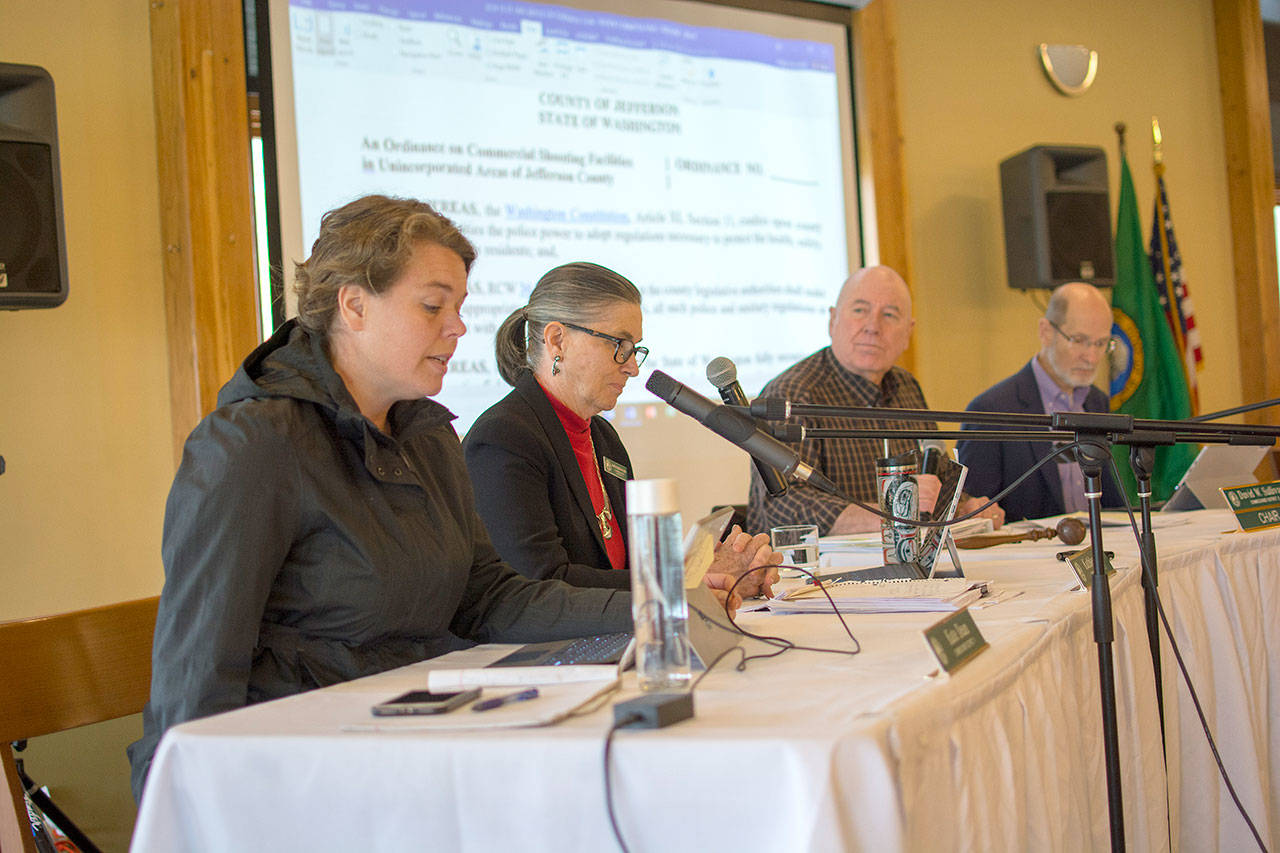 Jefferson County Commisioner Kate Dean, left, reads a prepared statement concerning the proposed shooting range ordinance during a special meeting Monday. (Jesse Major/Peninsula Daily News)
