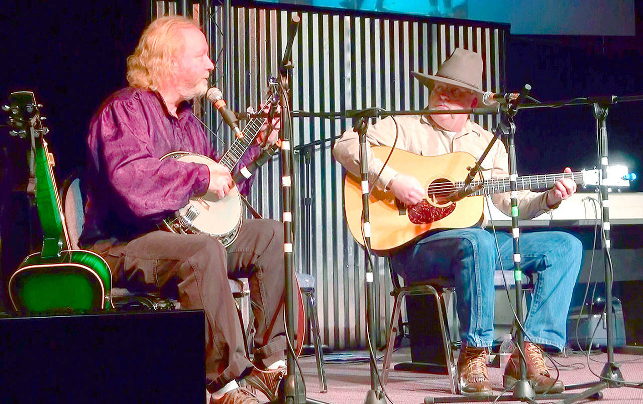 Mark Snook plays dobra and banjo while Steve Blanchard performs on guitar and mandolin in Slipshod.