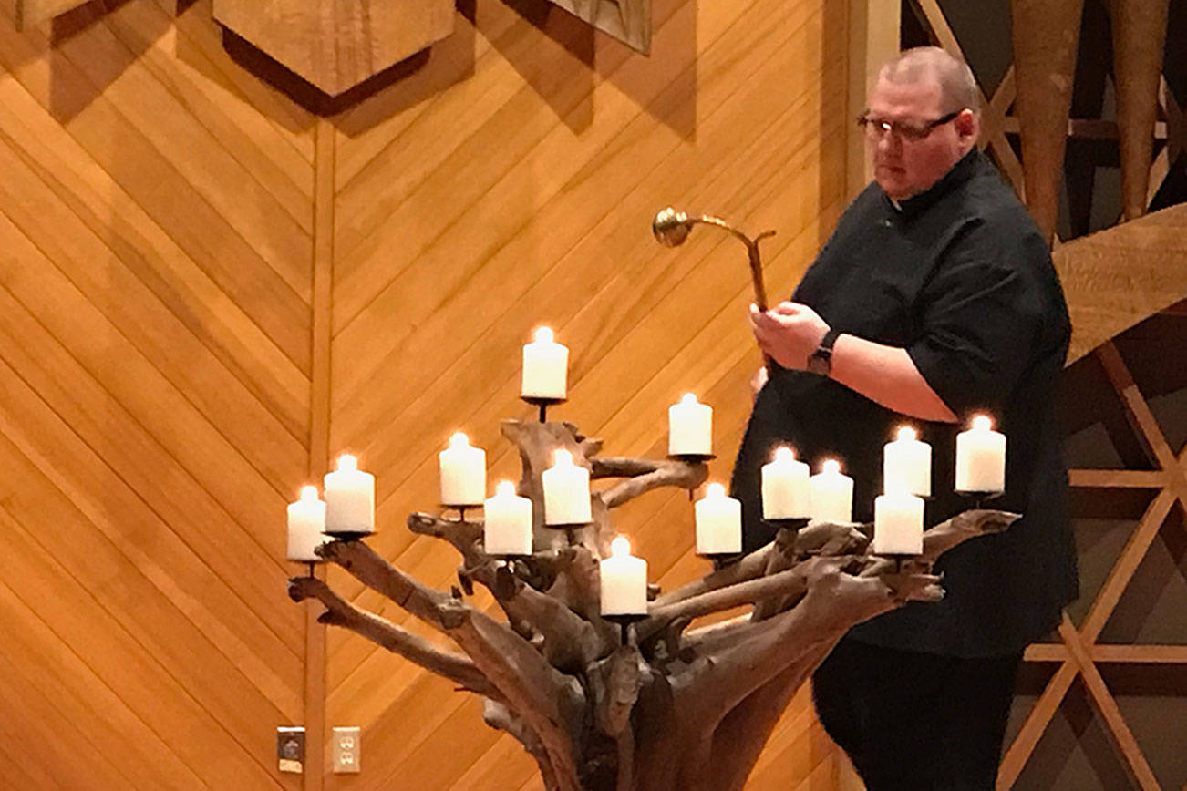 PHOTO: A light in the darkness at Port Angeles service