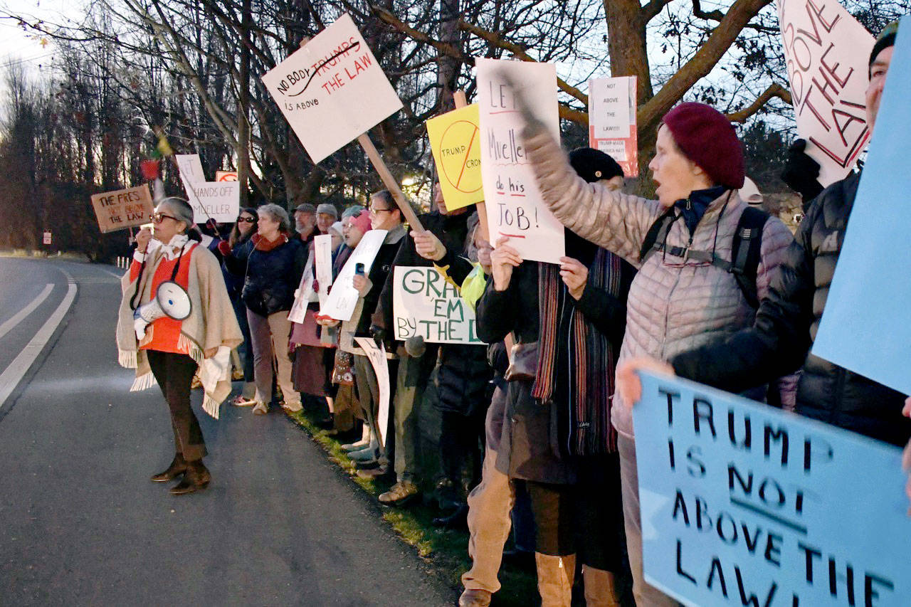 Port Townsend City Council member and rally co-organizer Michelle Sandoval stands in front of a crowd of about 300 Thursday. Rallies like this one were planned across the North Olympic Peninsula. (Jeannie McMacken/ Peninsula Daily News)