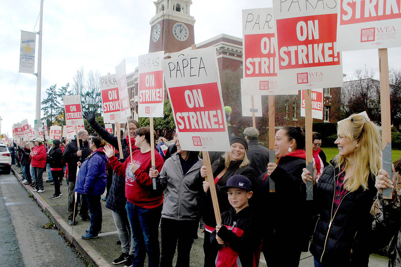 Kaston Beckett, 6, joined the crowd Friday in front of the Clallam County Courthouse as it supported striking Port Angeles School District paraeducators. (Paul Gottlieb /Peninsula Daily News)