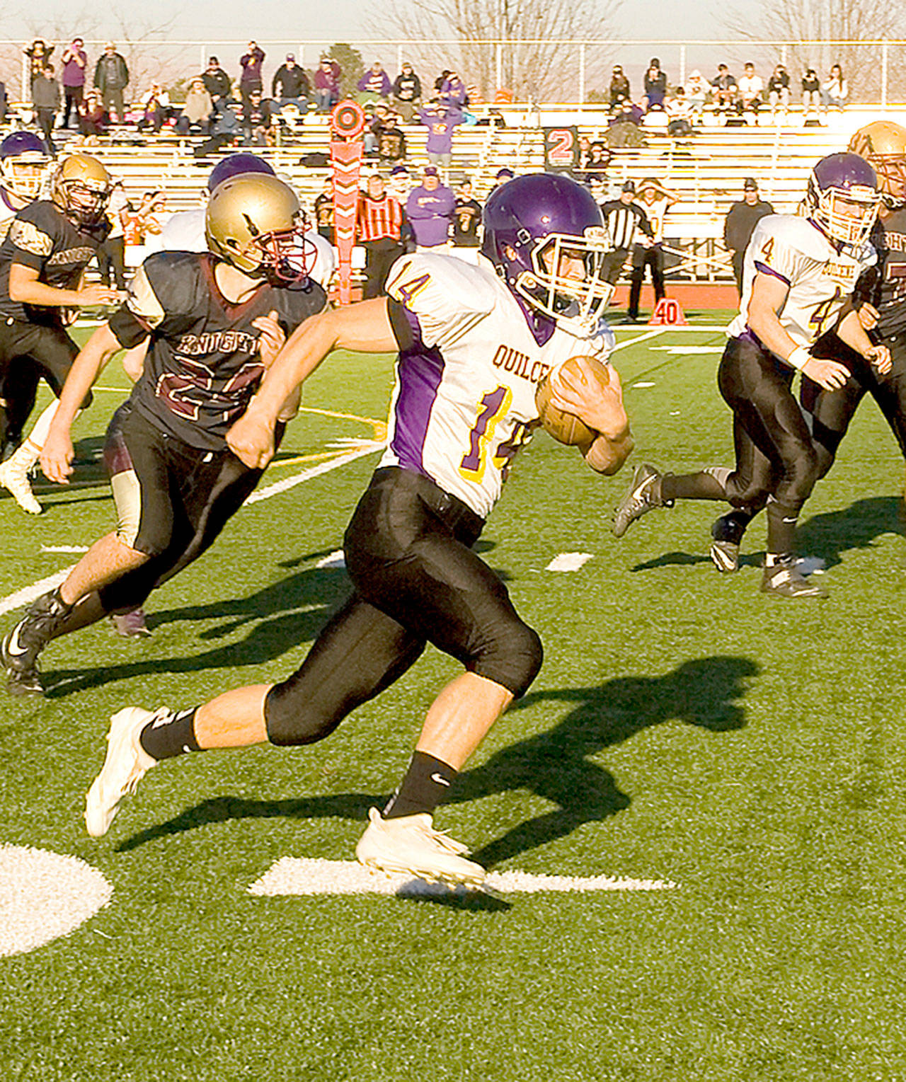 Quilcene’s Ben Bruner rumbles for part of his 217 yards against Sunnyside Christian on Saturday. The Rangers won the 1B state playoff game 54-50. (Patrick Shelby/Daily Sun)
