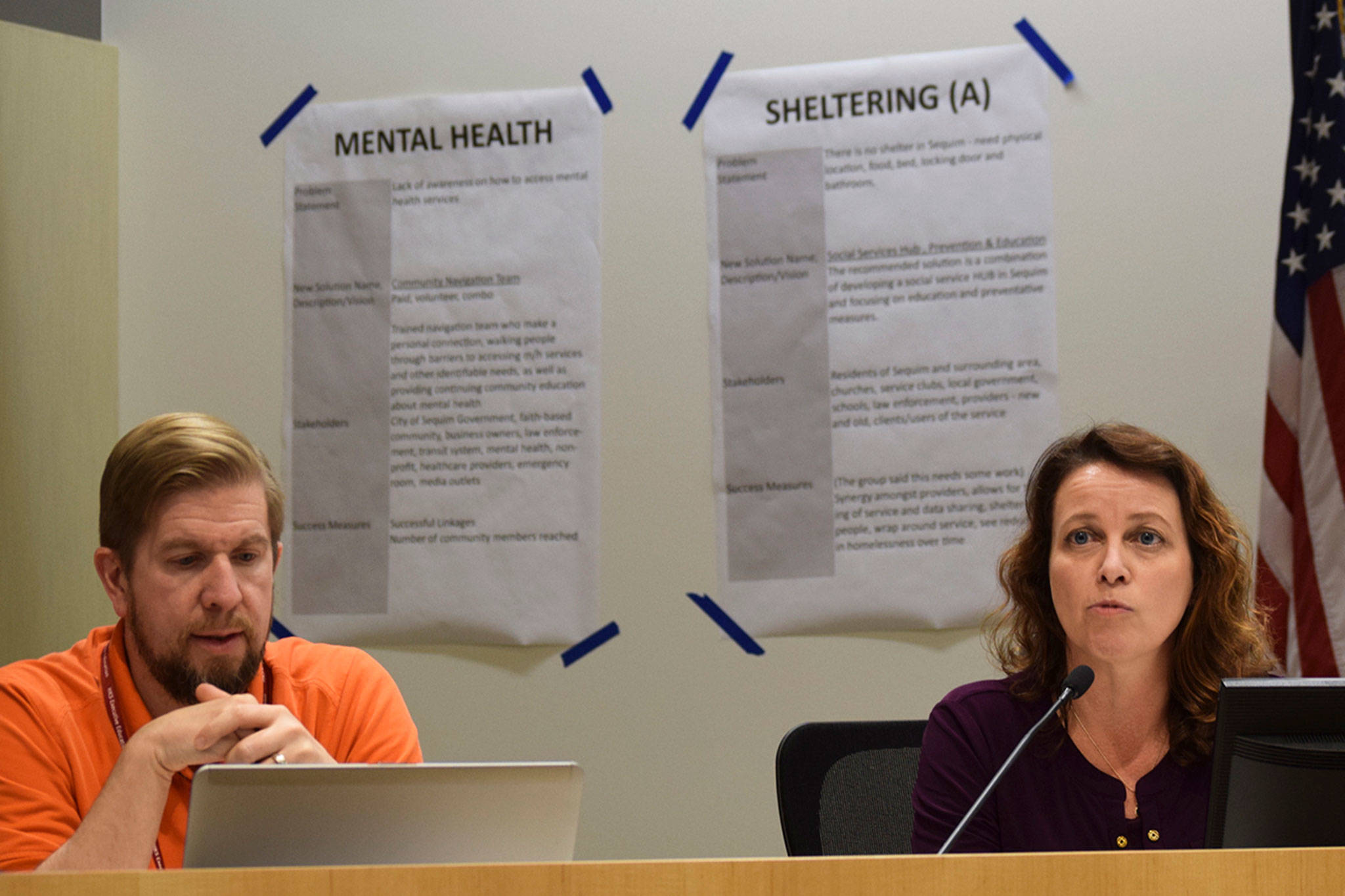 Sequim City Manager Charlie Bush, left, and City Attorney Kristina Nelson-Gross, discuss how the city is shifting gears and refining its approach to funding human service agencies in the Sequim area at a public workshop at the Civic Center on Nov. 14. (Erin Hawkins/Olympic Peninsula News Group)