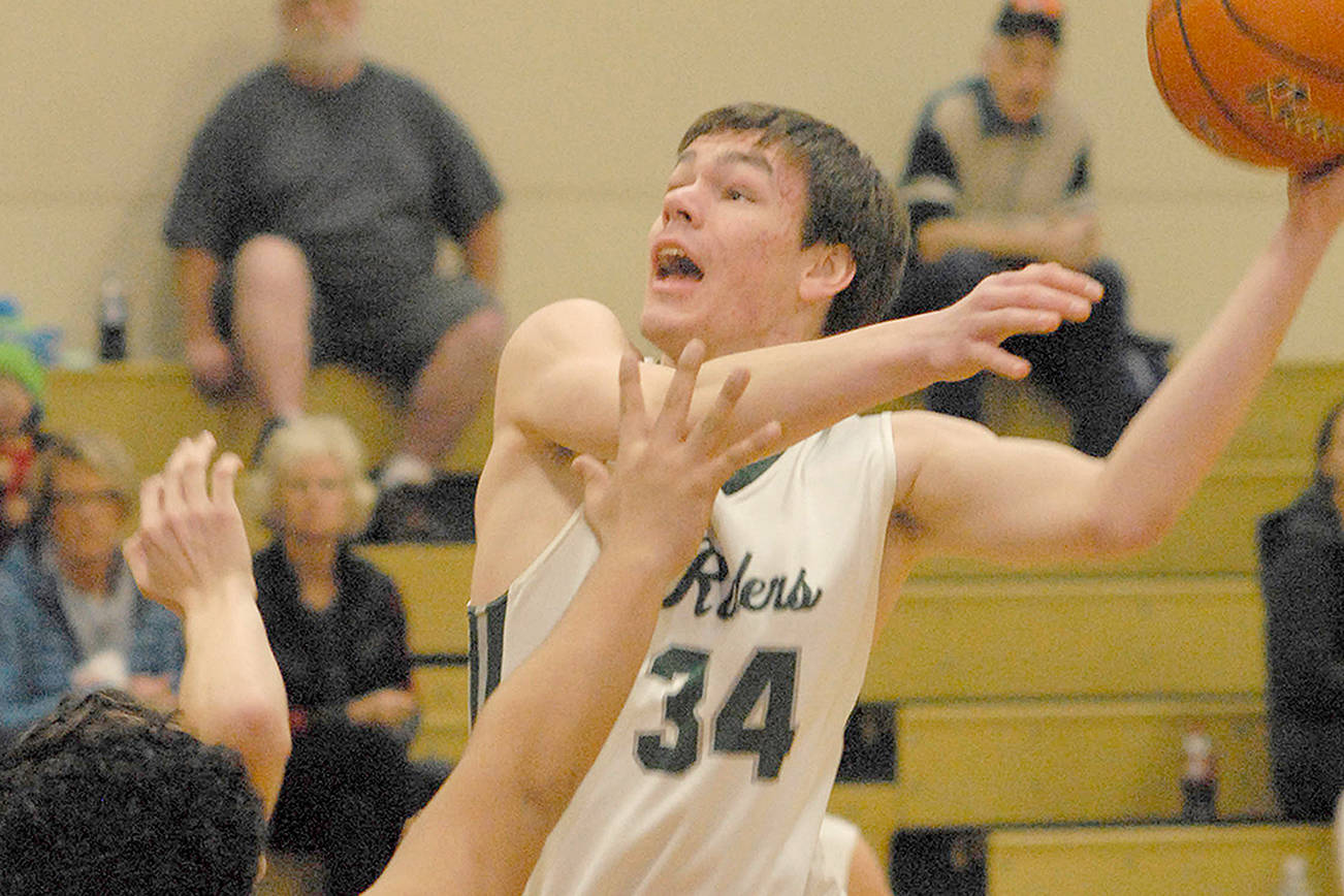 BOYS BASKETBALL: No ceiling for tall, experienced Roughriders