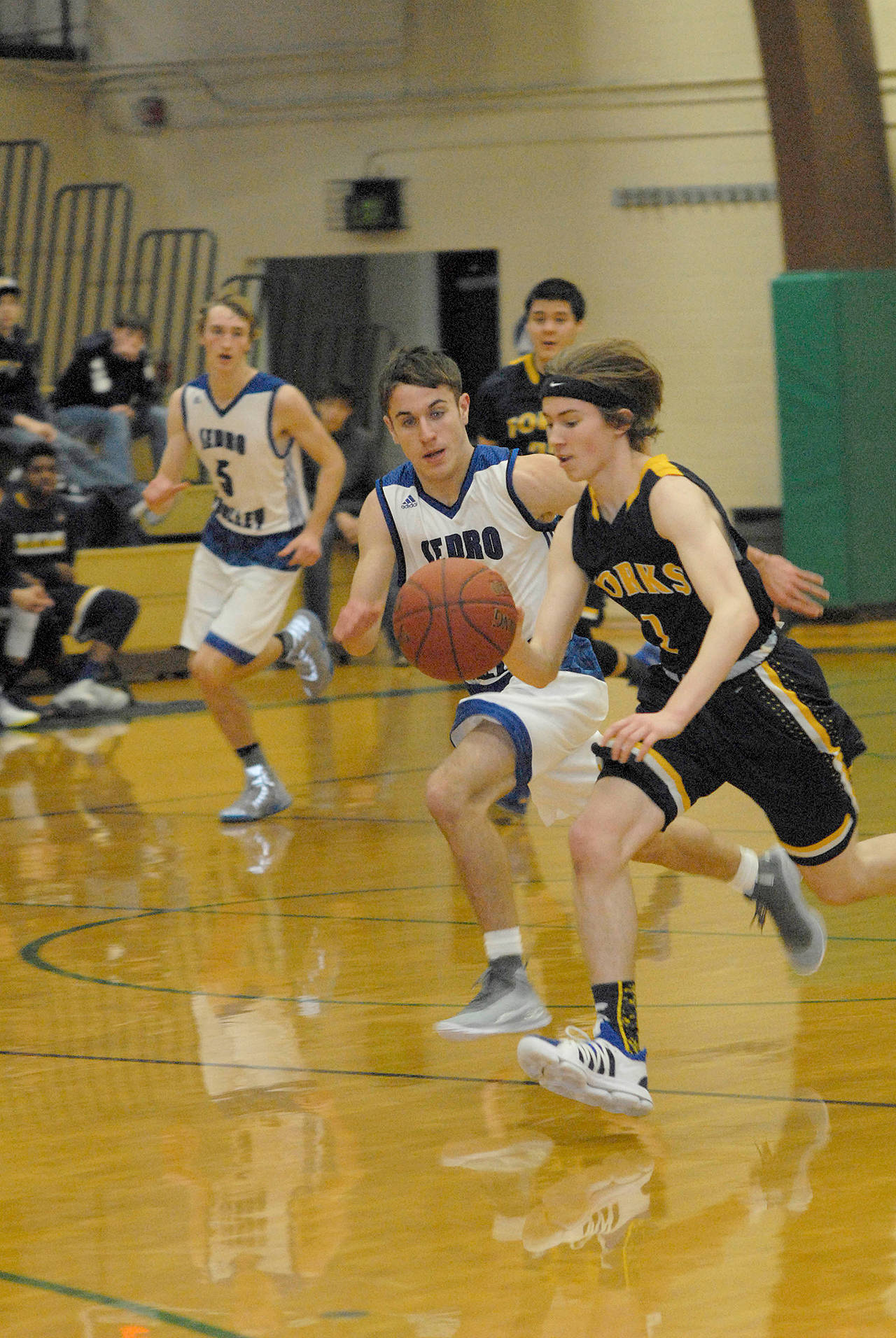Keith Thorpe/Peninsula Daily News Forks’ Seth Johnson, right, was an All-Evergreen League first-team selection last season.