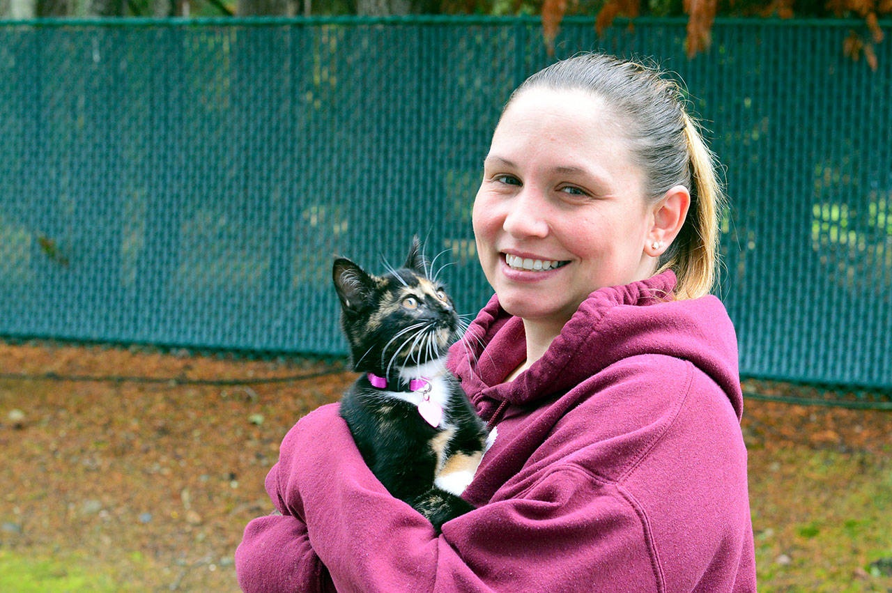 Trina Sloan recently adopted a kitten for her little boy — and for herself.                                (Diane Urbani de la Paz/for Peninsula Daily News)