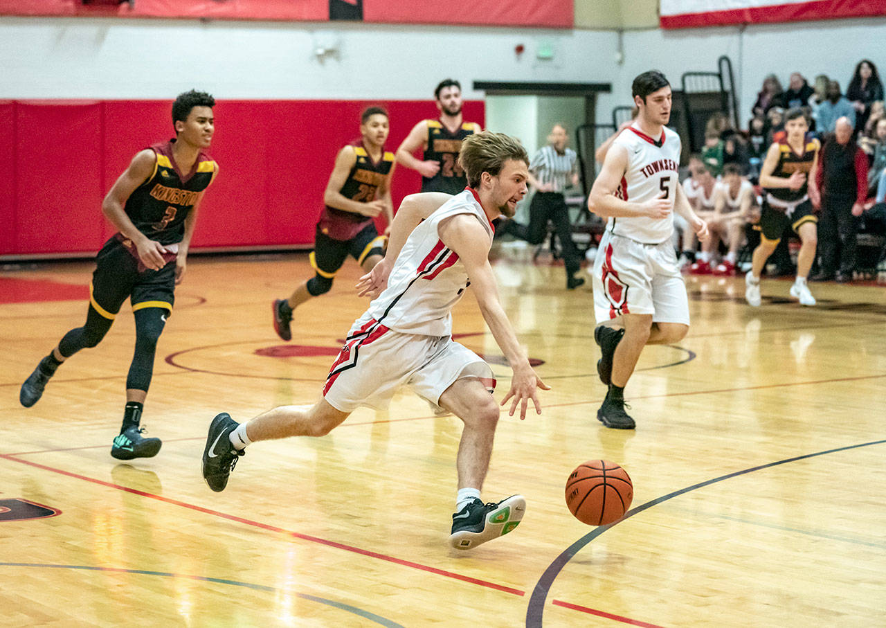 Steve Mullensky/for Peninsula Daily News Port Townsend’s Jaden Watkins drives for the basket and an easy lay-up after a steal during a game against Kingston on Friday at th ehigh school.