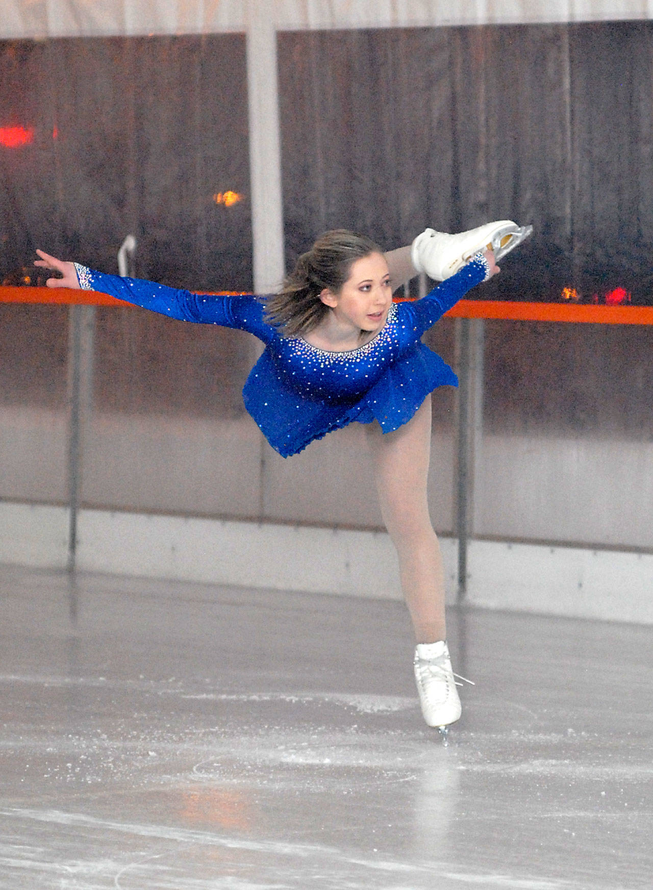 Savannah Morrey of Bremerton gives a figure skating demonstration Friday night at the Port Angeles Winter Ice Village. (Keith Thorpe/Peninsula Daily News)