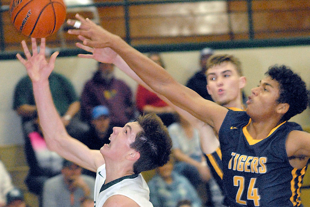 PREP BASKETBALL: Rider boys learn lessons in tough loss