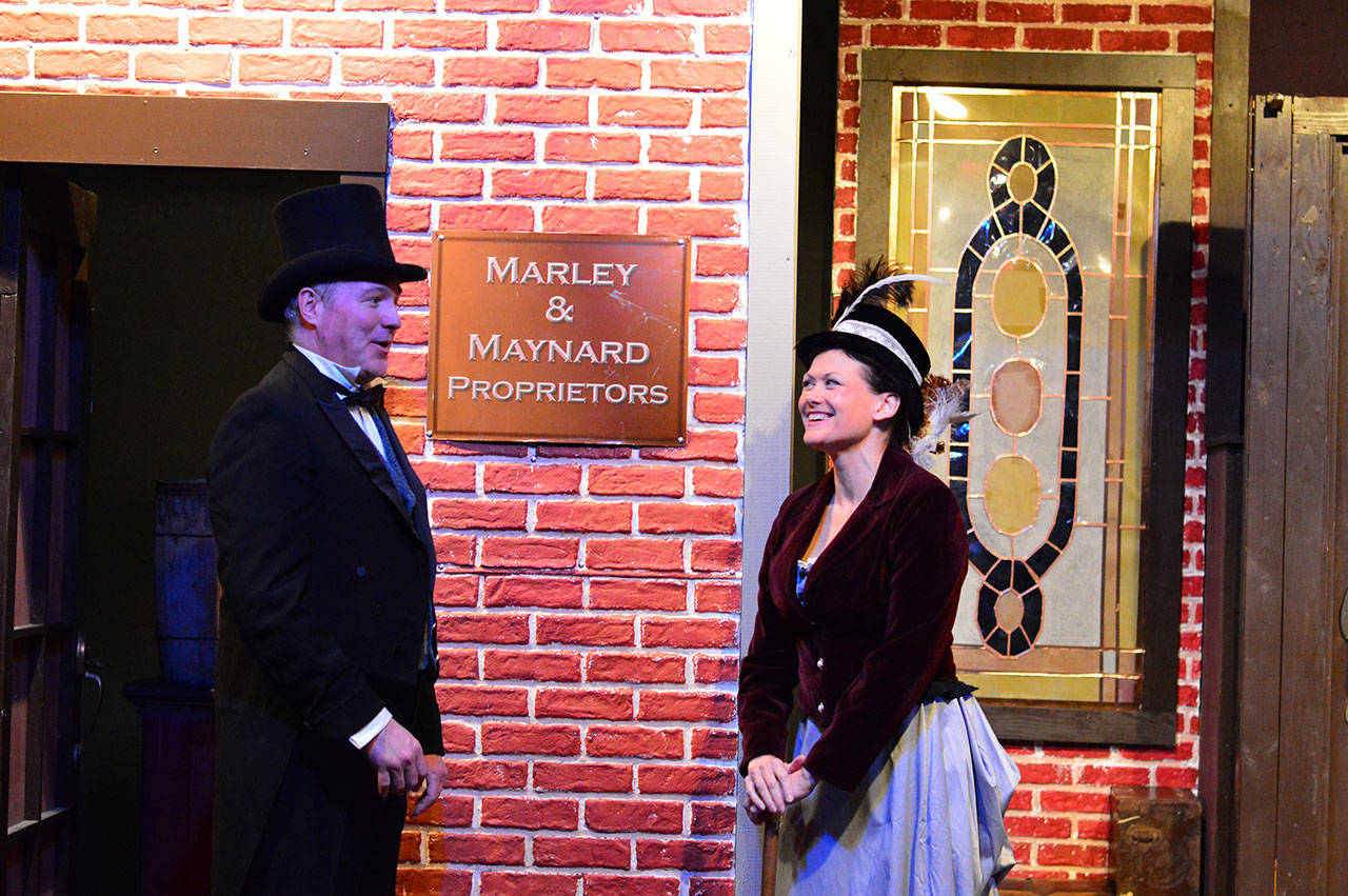 Jacob Marley (Greg Stone) is a land speculator and Henrietta Maynard (Vickie Daignault) is a Port Townsend entrepreneur in “Spirit of the Yule,” the musical opening this week at the Key City Playhouse. (Diane Urbani de la Paz)