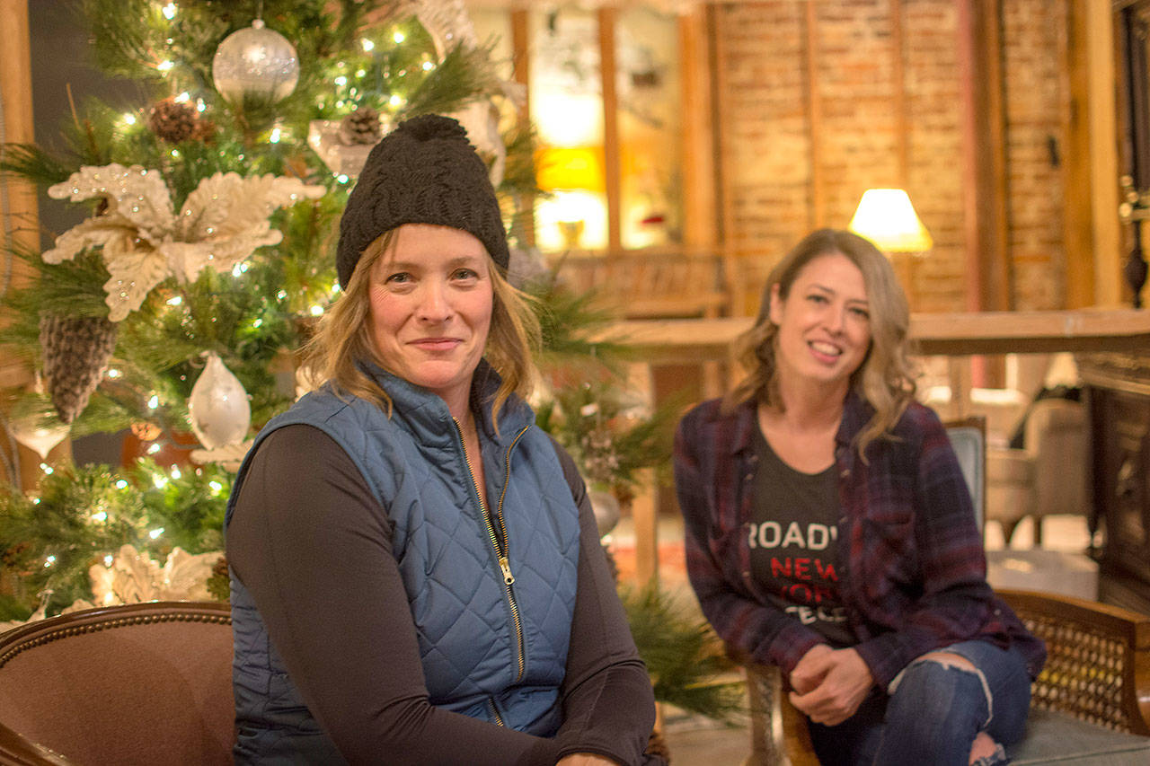 Shannon Cosgrove, left, and Naomi Alstrup are co-directing “Snow White and the Five Housemates,” a Christmas musical comedy that will be performed at the Lincoln Theater starting Friday. (Jesse Major/Peninsula Daily News)