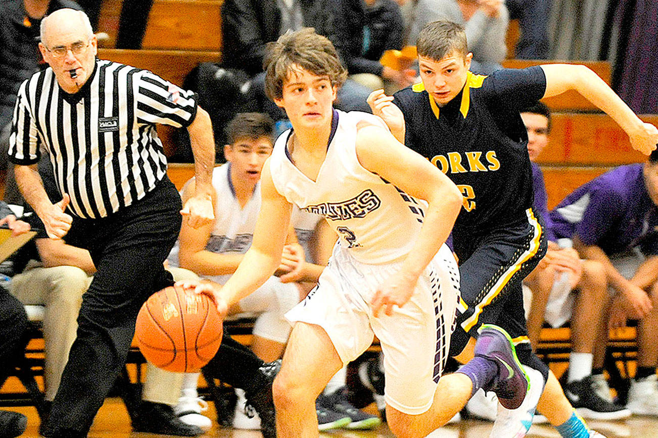 BOYS PREP BASKETBALL: Wolves slip past Spartans