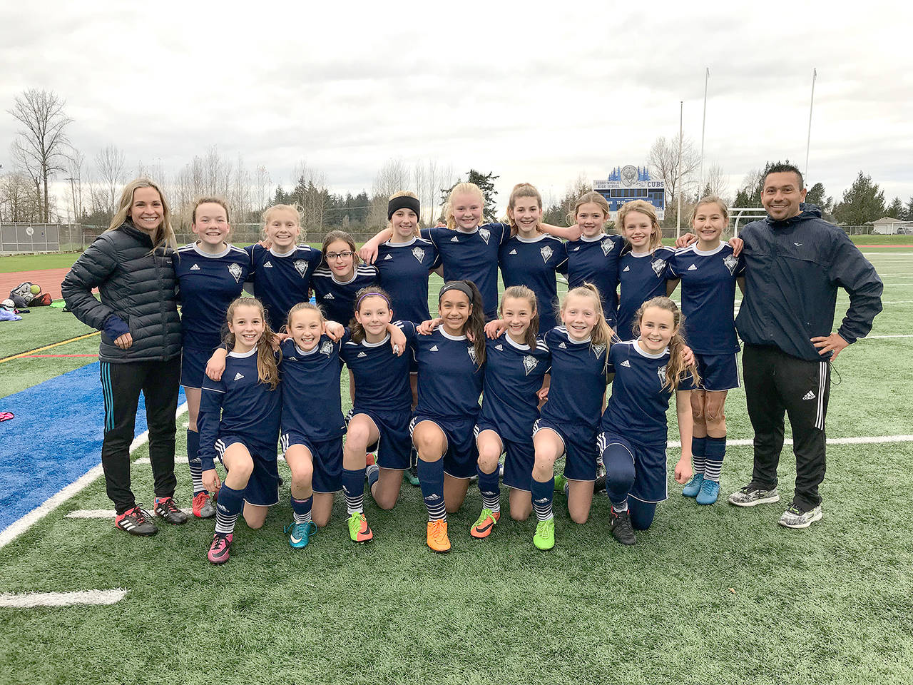 Storm King GU13 The Storm King Girls U-13 soccer team finished 11-1 this fall and earned the North Puget Sound League’s GU13 Division 2 Green Championship. The team, with players from Port Angeles, Sequim and Chimacum, scored 50 goals and allowed just seven. Back row pictured from left, assistant coach Robin Henrikson, Becca van Dyken, Jolene Vaara, Julia Raupp, Ava-Anne Sheahan, Paige Mason, Kaia Lestage, Eve Breithaupt, Ivy Barrett, Taryn Johnson, head coach Javier Gomez and front, Kinzley Henrikson, Gianna Riccobene, Waverly Mead, Jennyfer Gomez, Mikiah Winter, Isabelle Felton and Nikoline Updike.