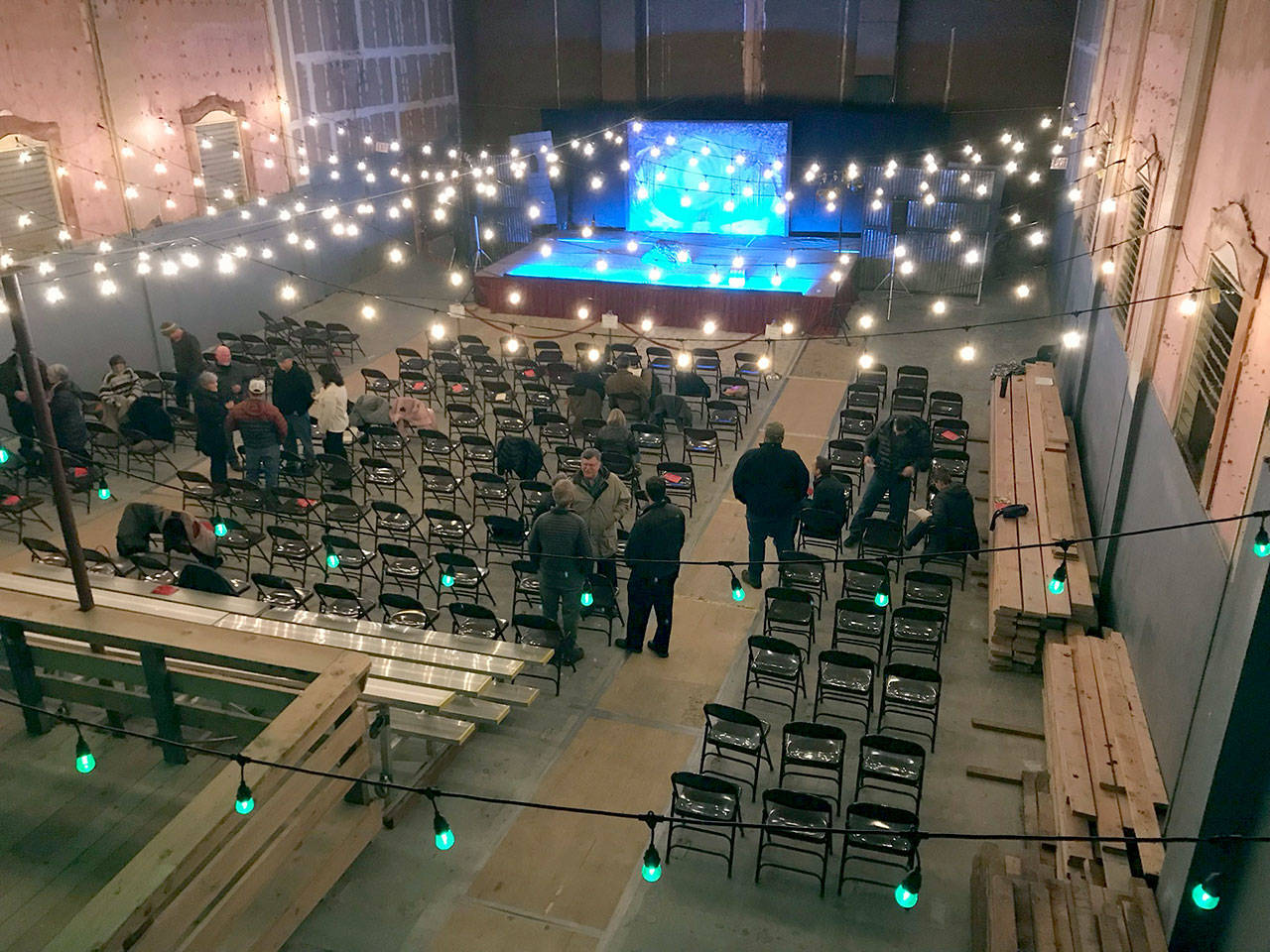 Christmas lights and temporary seating are part of the present interior of the Lincoln Theater in Port Angeles, shown here from the balcony during intermission for “Snow White and the Five Housemates.” (Paul Gottlieb/Peninsula Daily News)