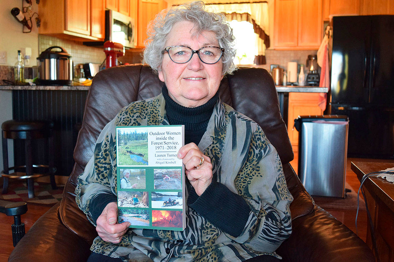 Lauren Turner hopes to inspire other women to find a profession in the U.S. Forest Service, as she did, with her new book “Outdoor Women Inside the Forest Service” that tells her story as well as those of 41 other women employed in the agency. (Erin Hawkins/Olympic Peninsula News Group)