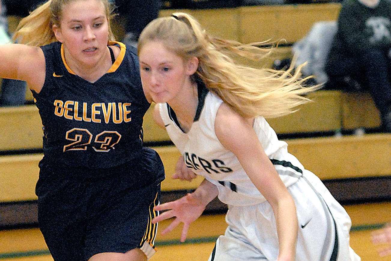 PREP GIRLS BASKETBALL: Roughriders clutch in OT