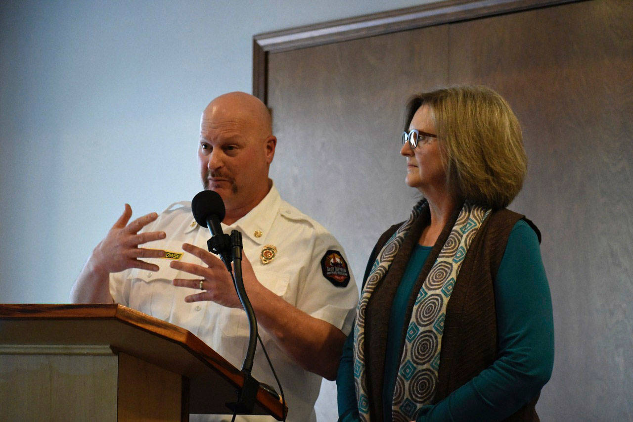 East Jefferson Fire-Rescue Chief Jim Walkowski and Port Townsend Mayor Deborah Stinson present details about the city’s proposed annexation that will be on the Feb. 12 ballot to the Jefferson County Chamber of Commerce on Monday. (Jeannie McMacken/Peninsula Daily News)