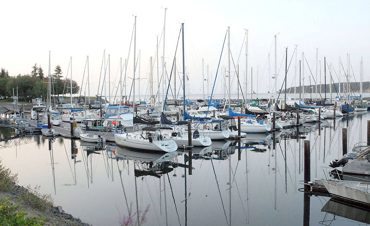 Boats float on placid water at John Wayne Marina in Sequim. (Keith Thorpe/Peninsula Daily News)
