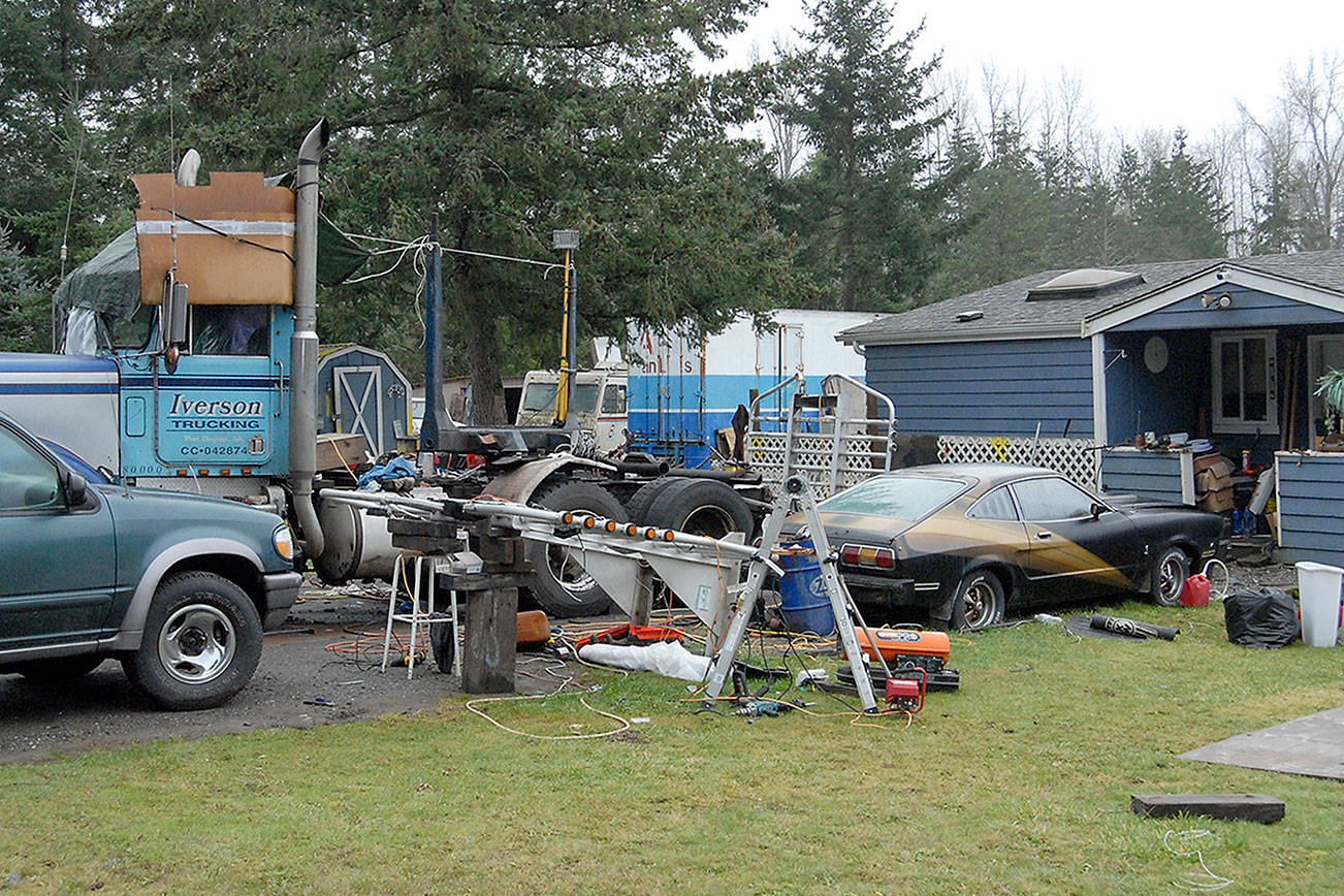 Evidence sifted in triple homicide investigation