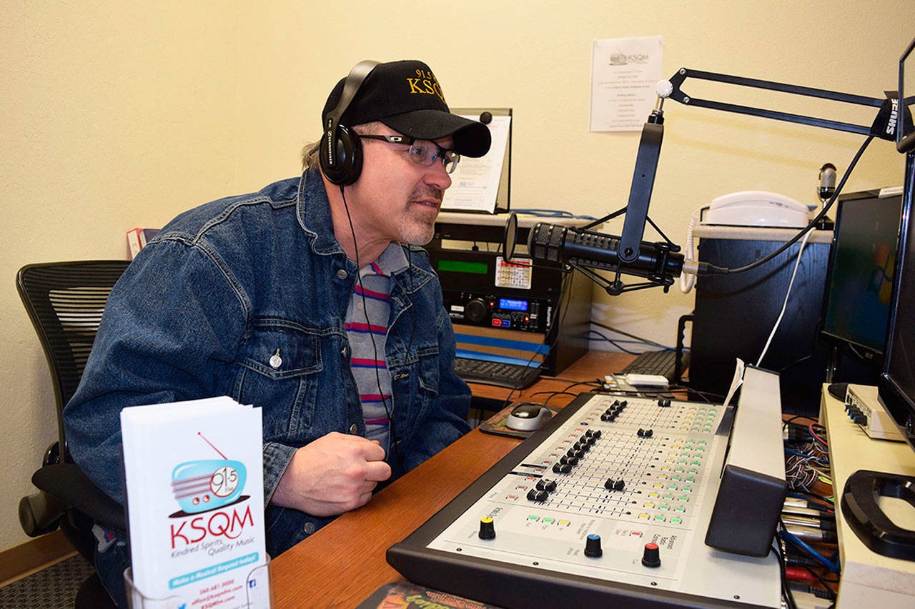 Andrew Woodson, a KSQM 91.5 FM broadcaster, pictured here on a recent morning, provided emergency information from the radio station’s First Federal Tower at the John Wayne Memorial Transmission Facility in the foothills of Blue Mountain when Clallam County experienced a major power outage in mid-December. (Erin Hawkins/Olympic Peninsula News Group)