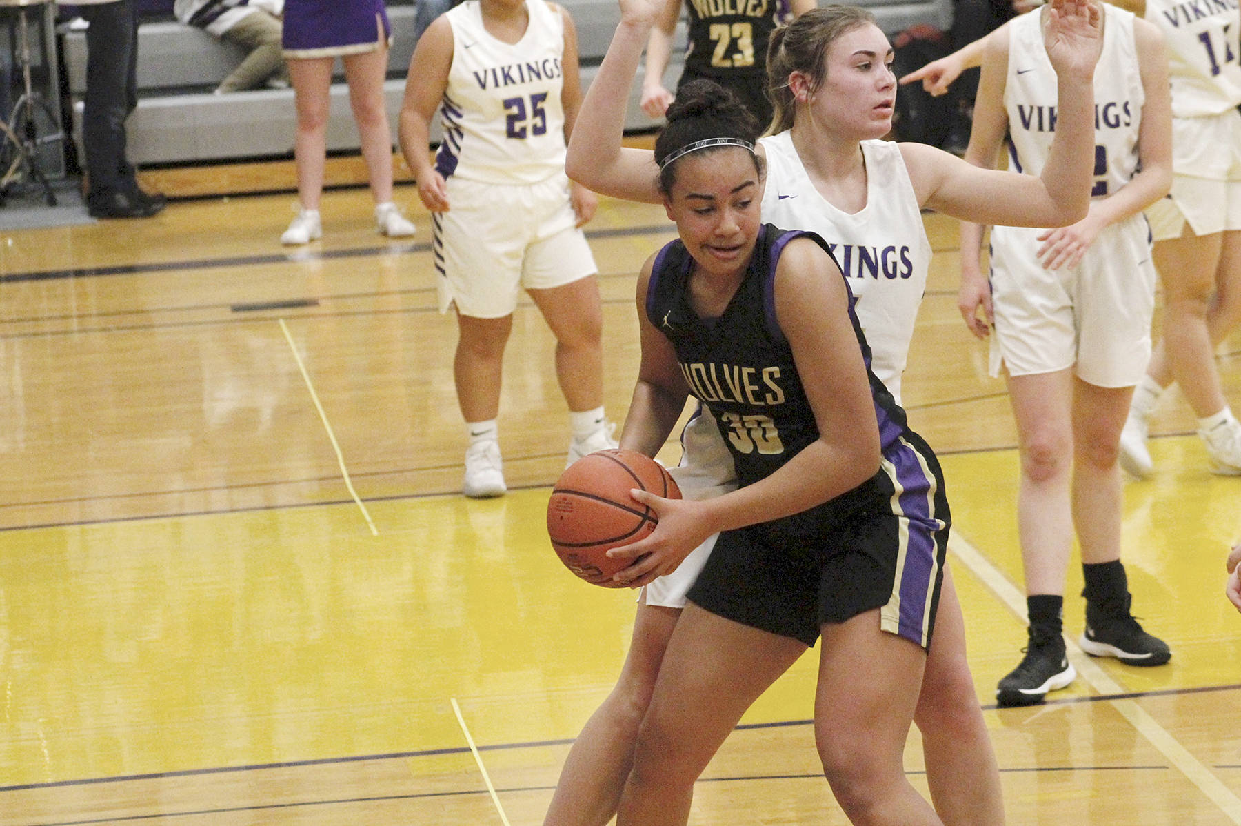 <strong>Mark Krulish</strong>/Kitsap News Group Sequim’s Jayla Julmist, with ball, is guarded by North Kitsap’s Maddie Pruden.