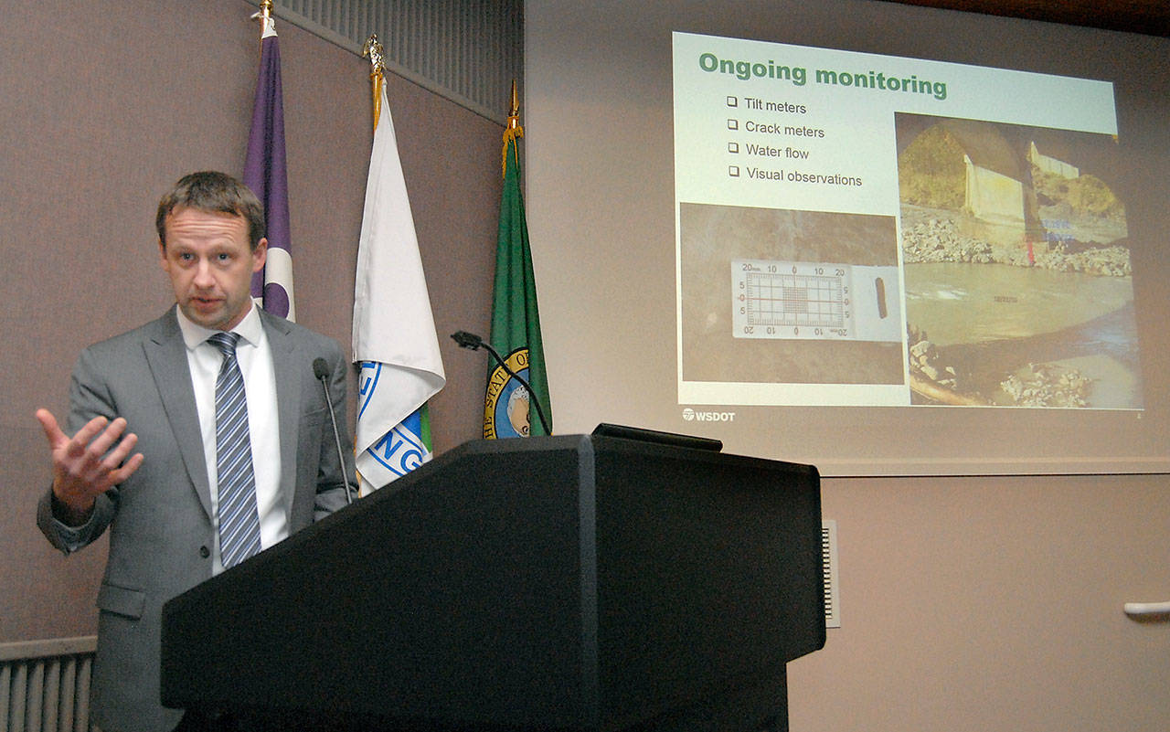 Steve Roark, assistant regional administrator for the state Department of Transportation, speaks about the current state of the U.S. Highway 101 bridge over the Elwha River and plans to replace it during a special presentation to the Port Angeles City Council on Tuesday. (Keith Thorpe/Peninsula Daily News)